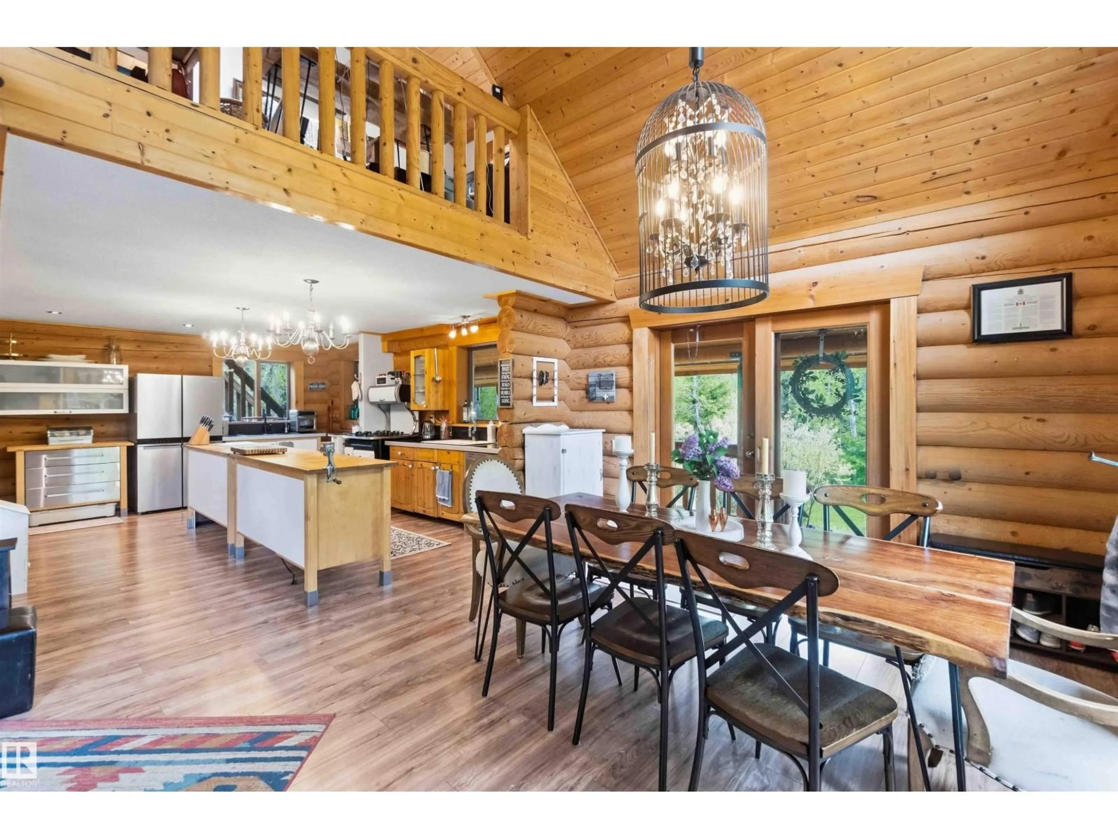 Open concept kitchen, wood/laminate floor for #17 A - 15031 TWP ROAD 462, Rural Wetaskiwin County Alberta T0C2V0