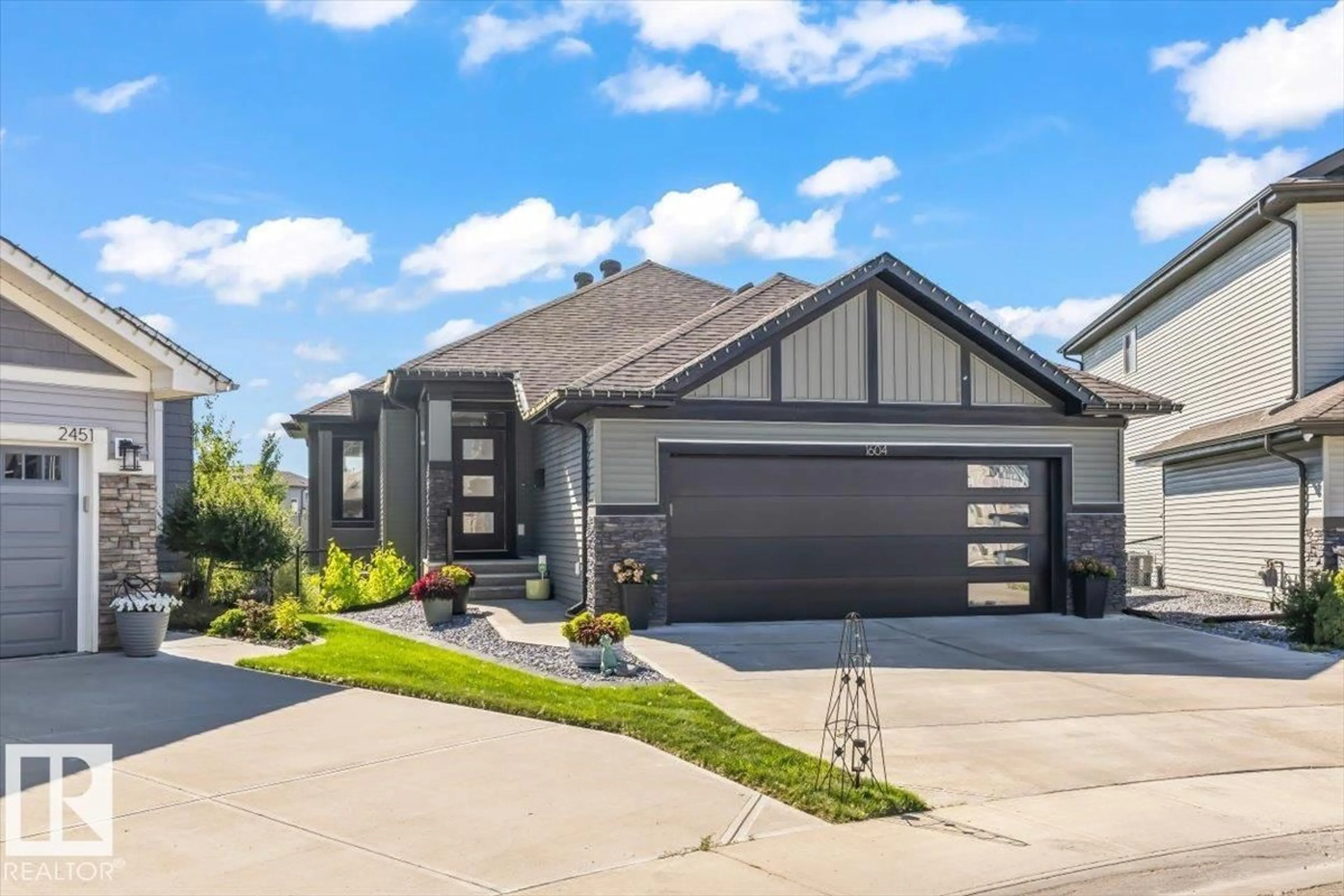 Home with brick exterior material, street for NW - 1604 25 ST, Edmonton Alberta T6T2H5