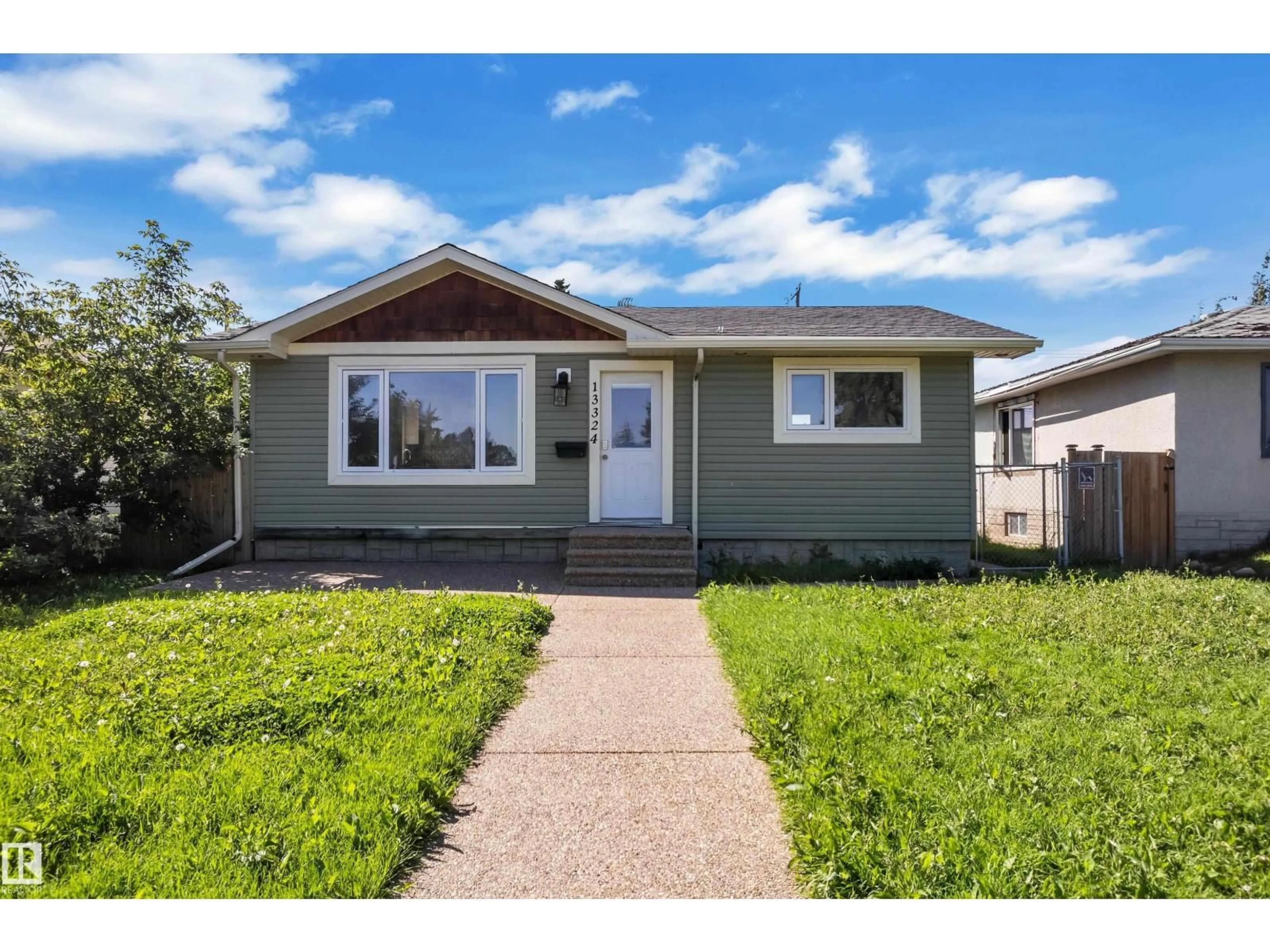 Home with vinyl exterior material, street for NW - 13324 62 ST, Edmonton Alberta T5A0V6