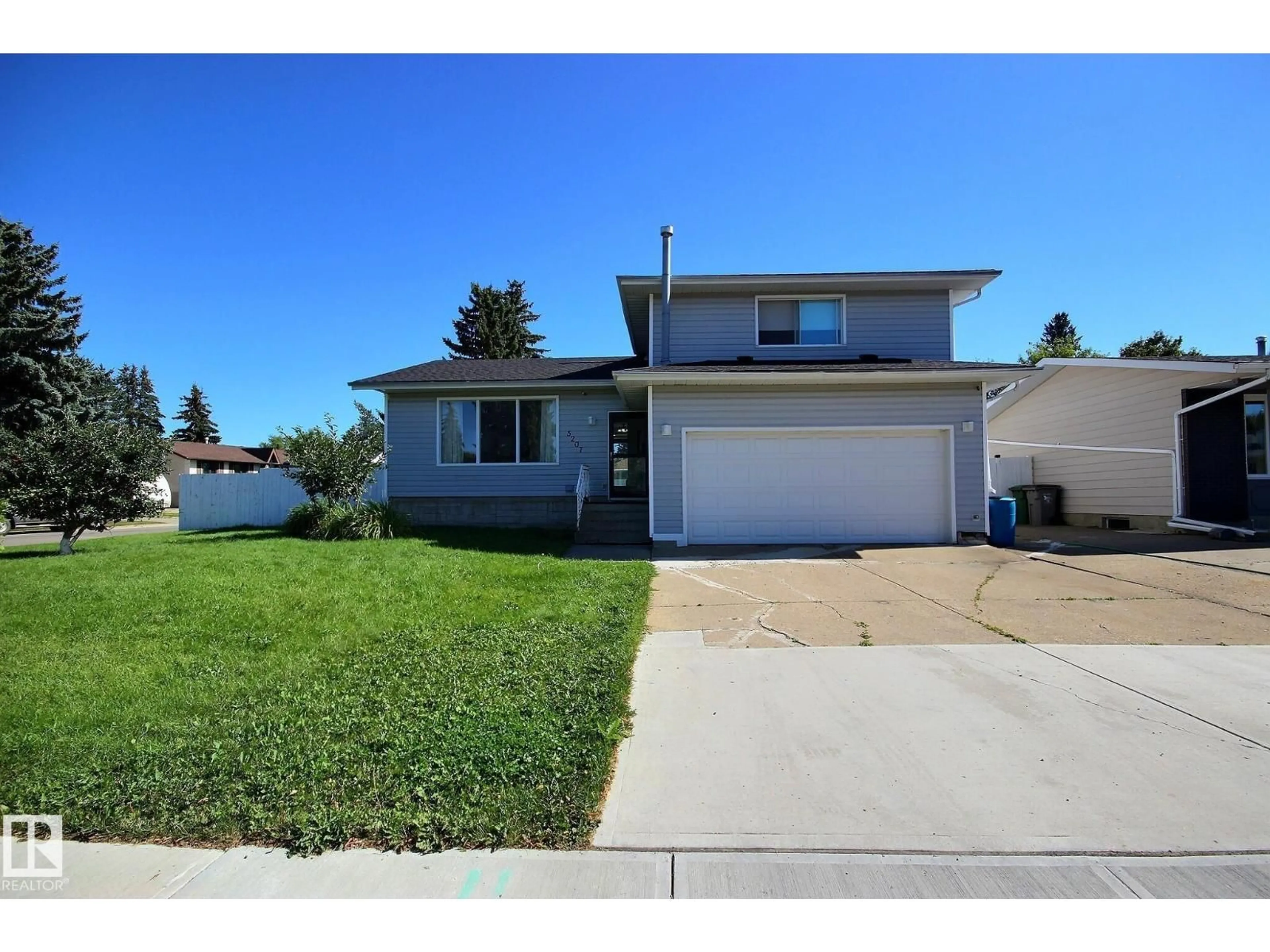 Home with vinyl exterior material, street for 5207 46 ST, Beaumont Alberta T4X1H9