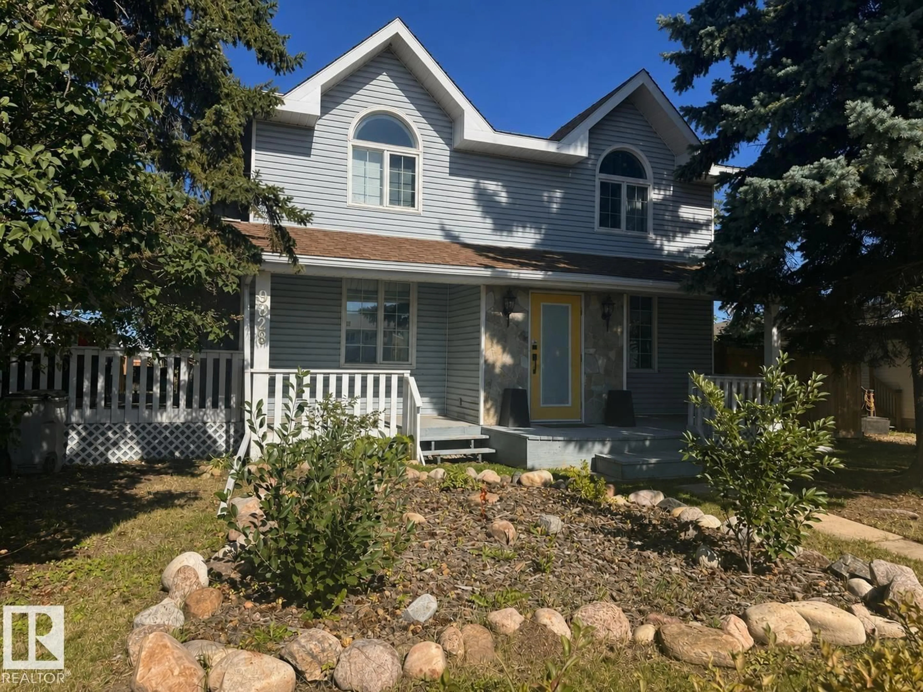 Home with vinyl exterior material, street for 9828 110 ST, Westlock Alberta T7P1P6