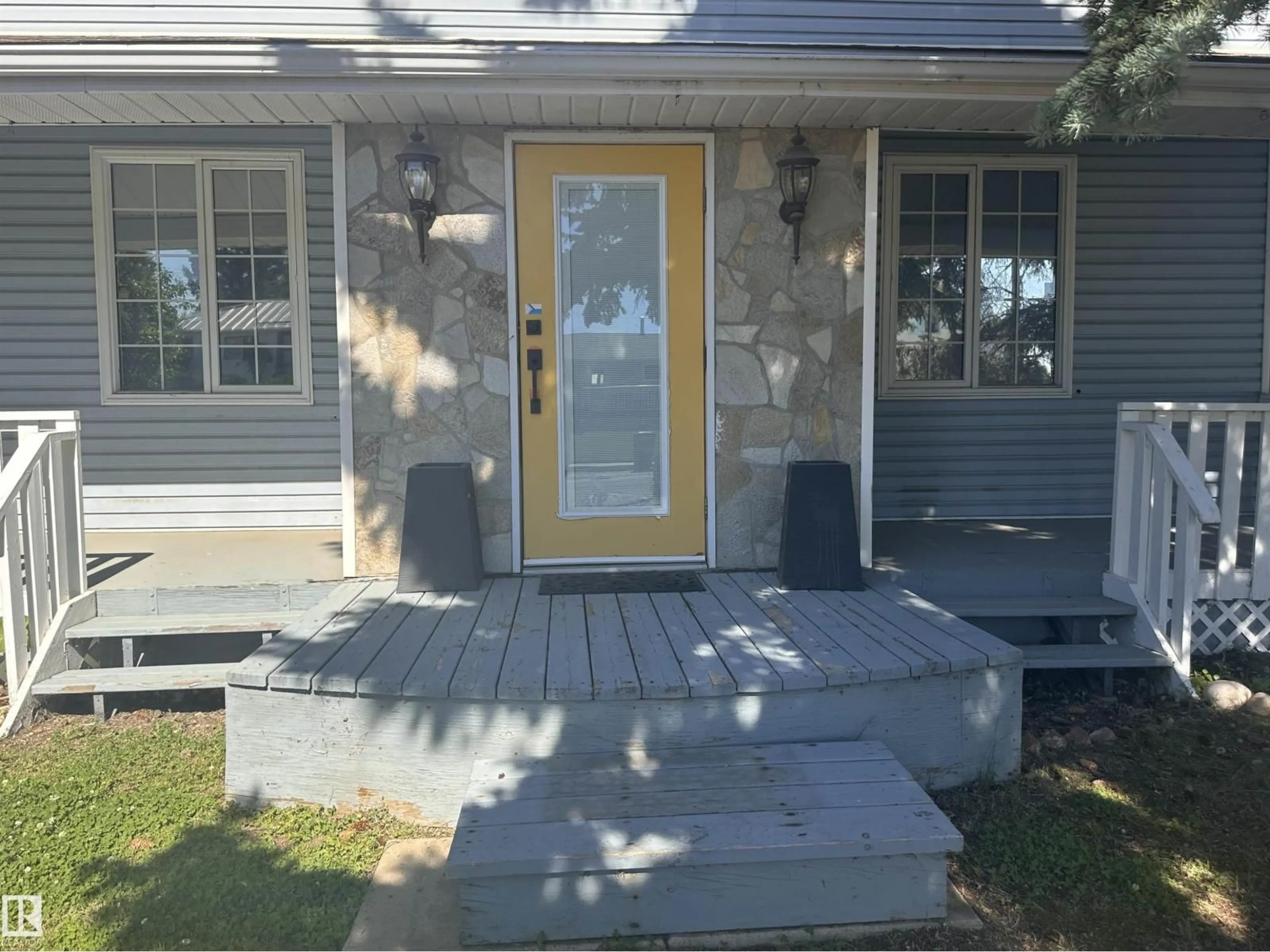Home with vinyl exterior material, street for 9828 110 ST, Westlock Alberta T7P1P6