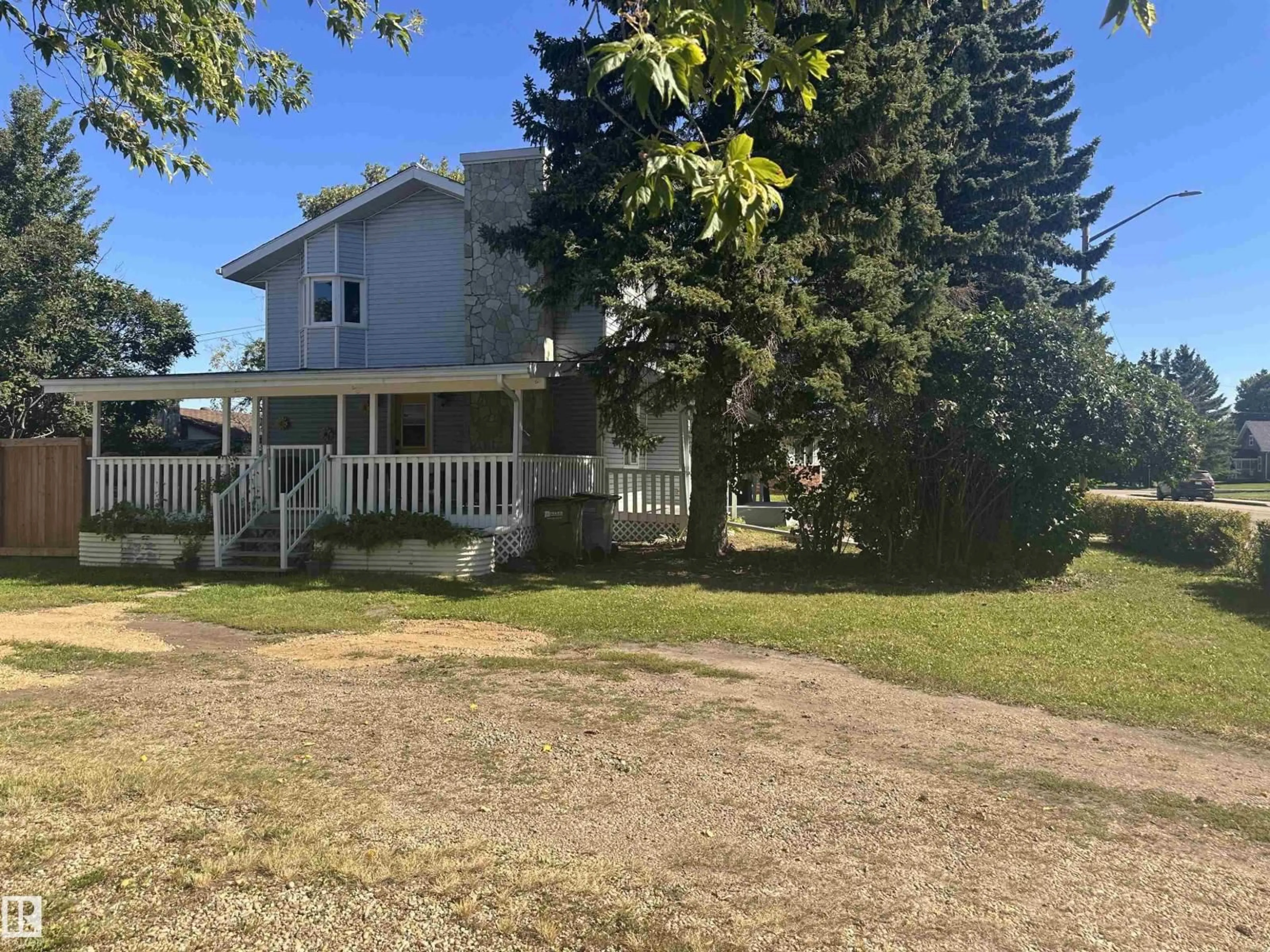 A pic from outside/outdoor area/front of a property/back of a property/a pic from drone, street for 9828 110 ST, Westlock Alberta T7P1P6