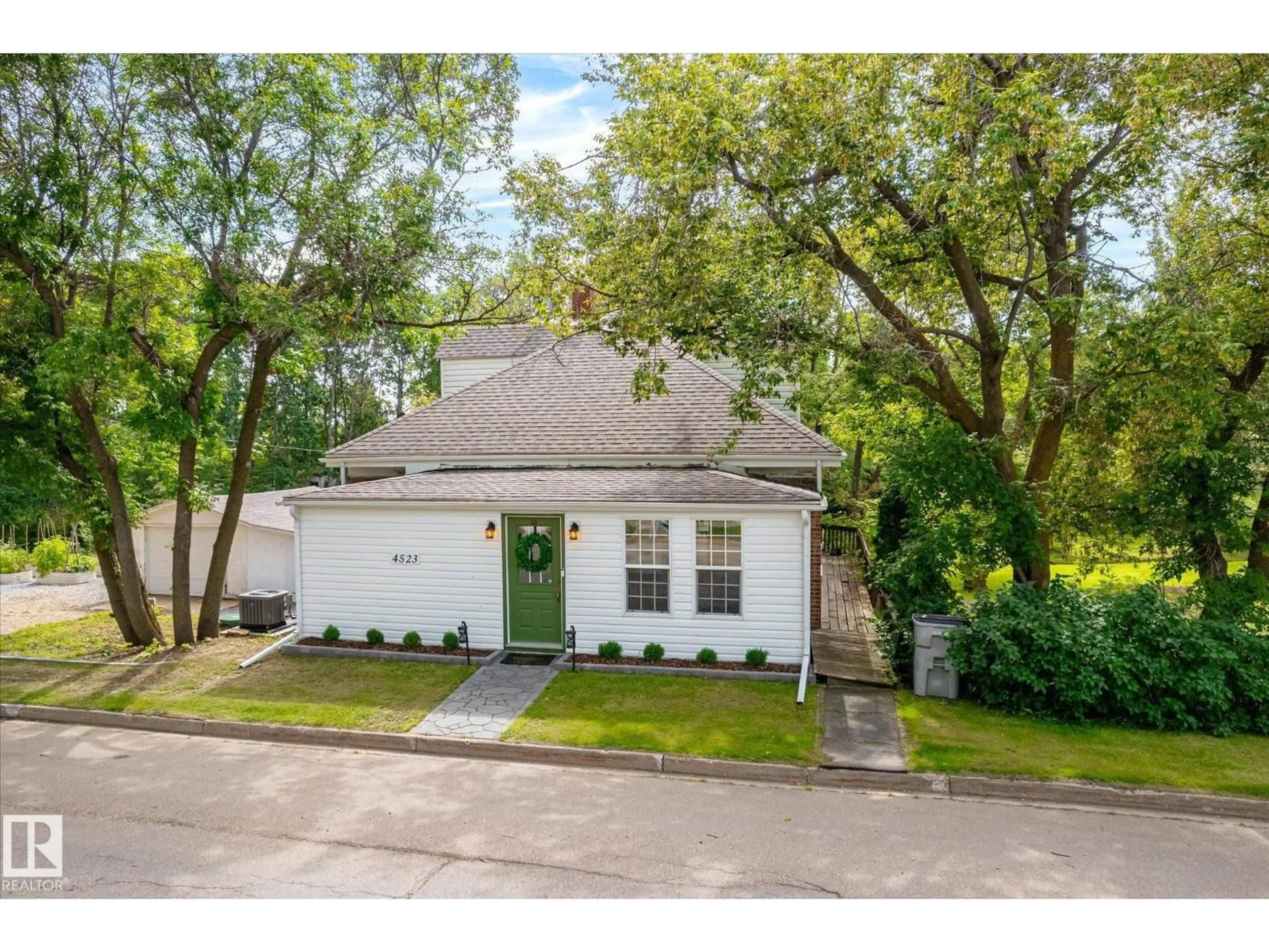 A pic from outside/outdoor area/front of a property/back of a property/a pic from drone, street for 4523 50 AV, Legal Alberta T0G1L0