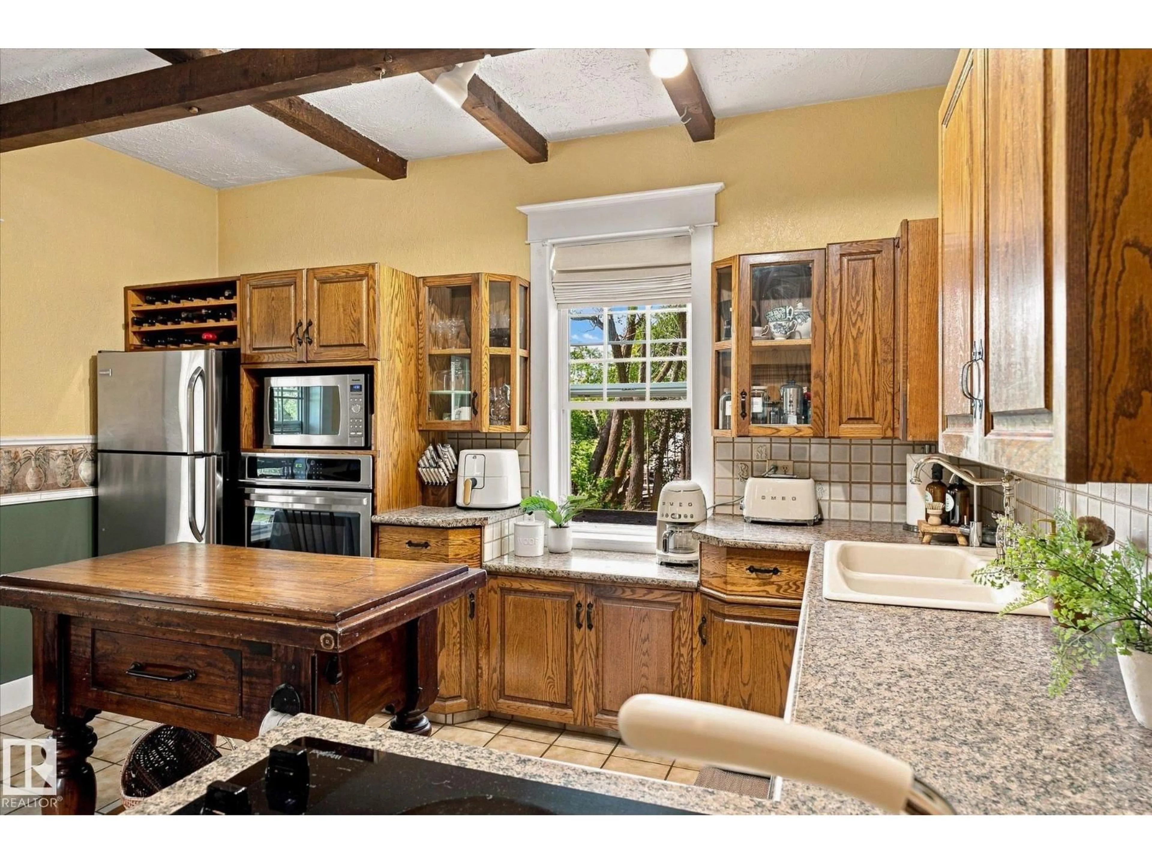 Open concept kitchen, ceramic/tile floor for 4523 50 AV, Legal Alberta T0G1L0