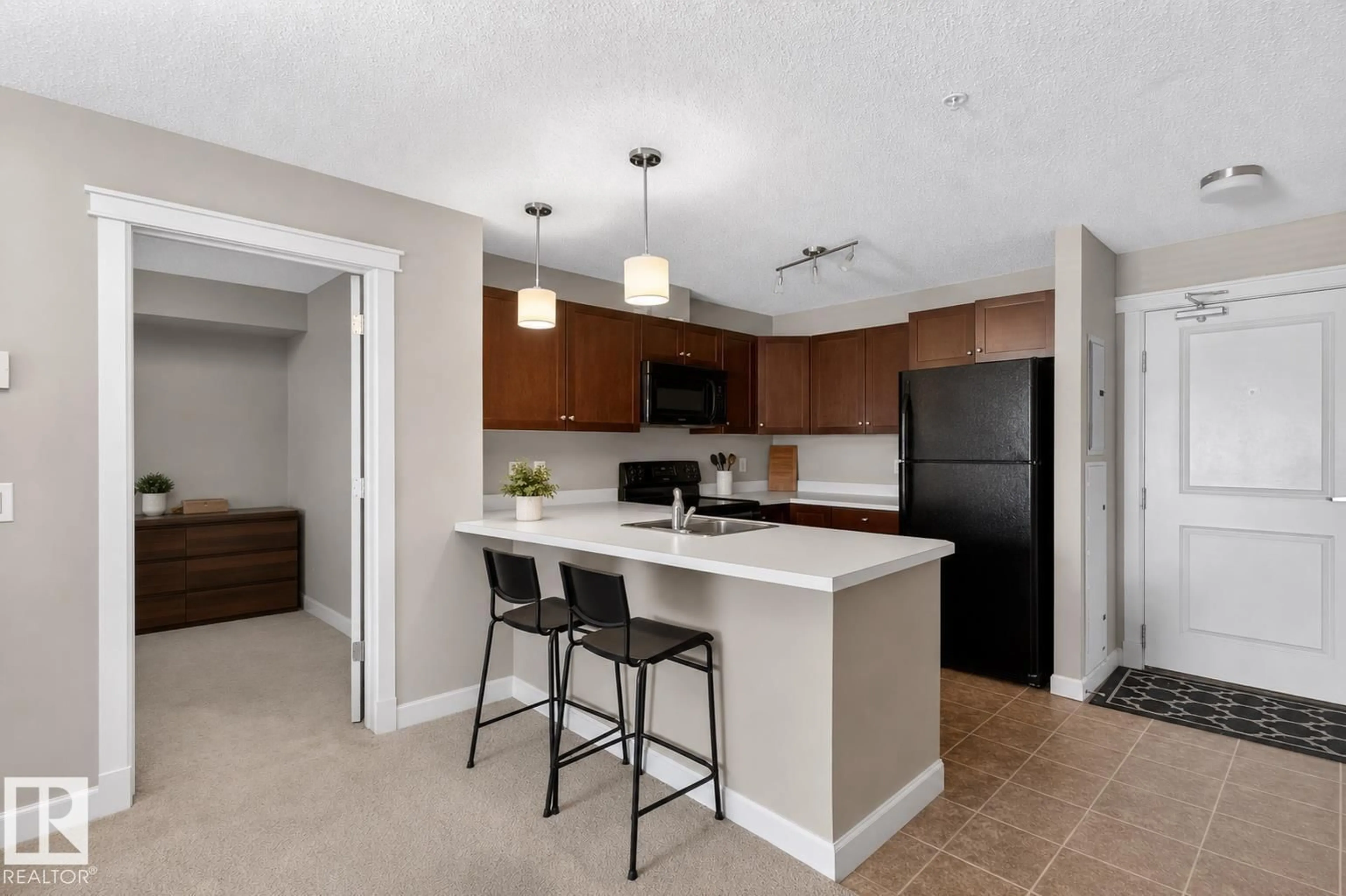 Open concept kitchen, ceramic/tile floor for #302 - 3715 WHITELAW LN, Edmonton Alberta T6W2C3