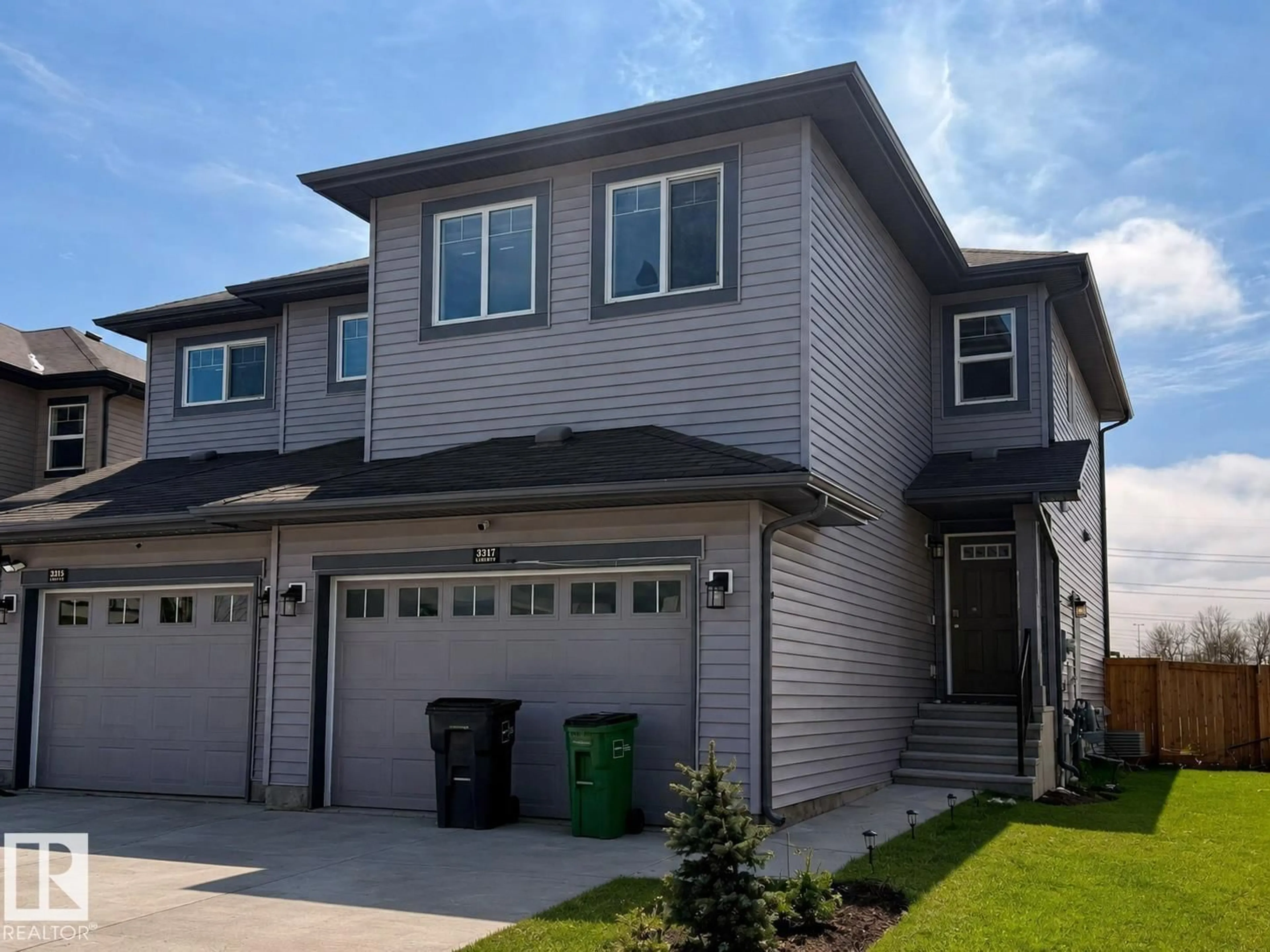 Home with vinyl exterior material, street for 3317 11 AV, Edmonton Alberta T6T2C5