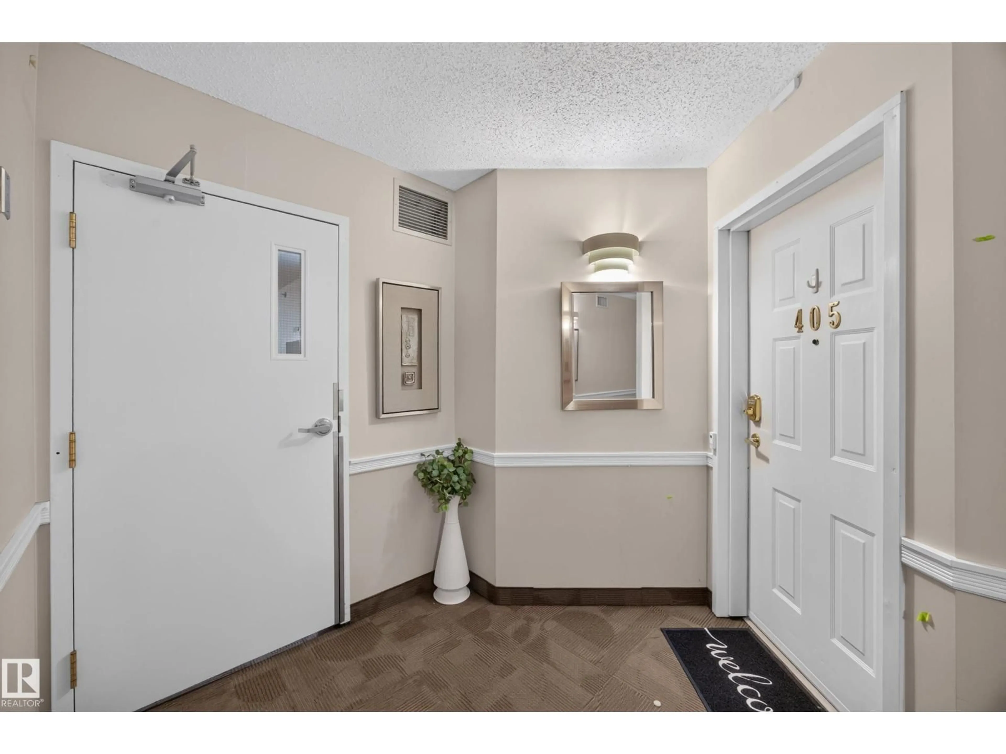 Indoor entryway for #405 - 5204 25 AV, Edmonton Alberta T6L6R2
