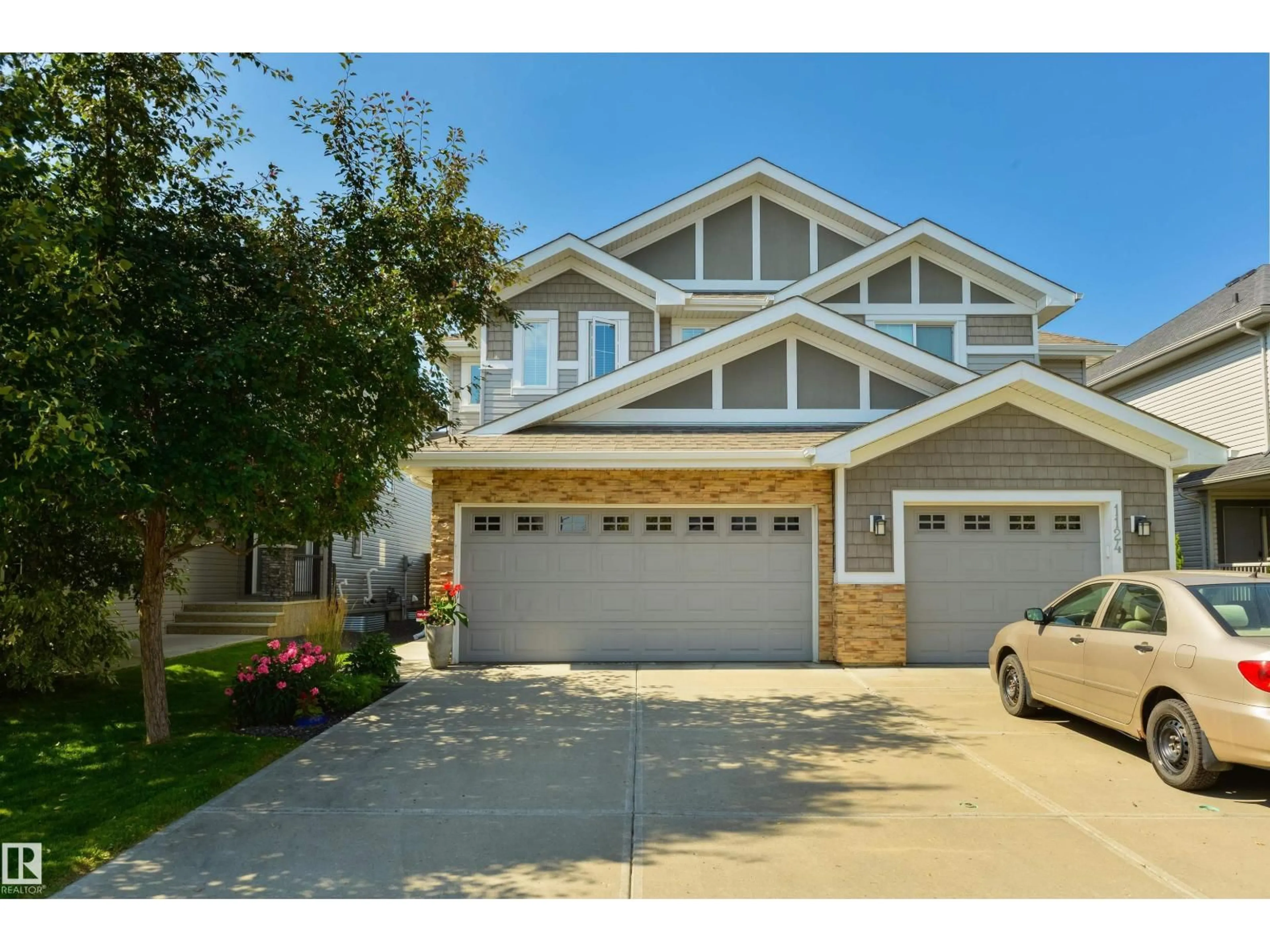 Home with vinyl exterior material, street for SW - 1126 162 ST, Edmonton Alberta T6W2L1