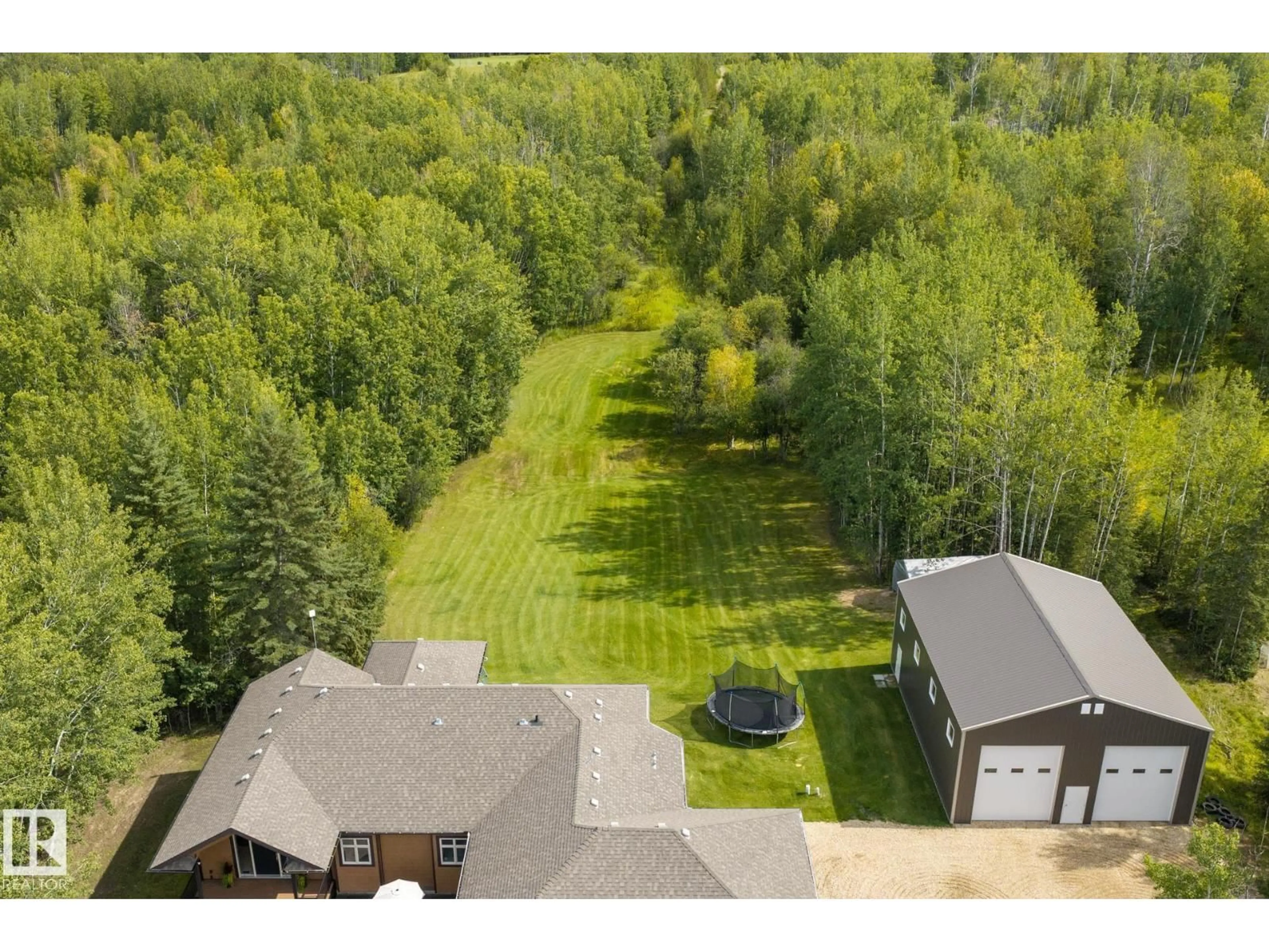 A pic from outside/outdoor area/front of a property/back of a property/a pic from drone, forest/trees view for 211 ASPEN DR, Rural Athabasca County Alberta T9S1S3