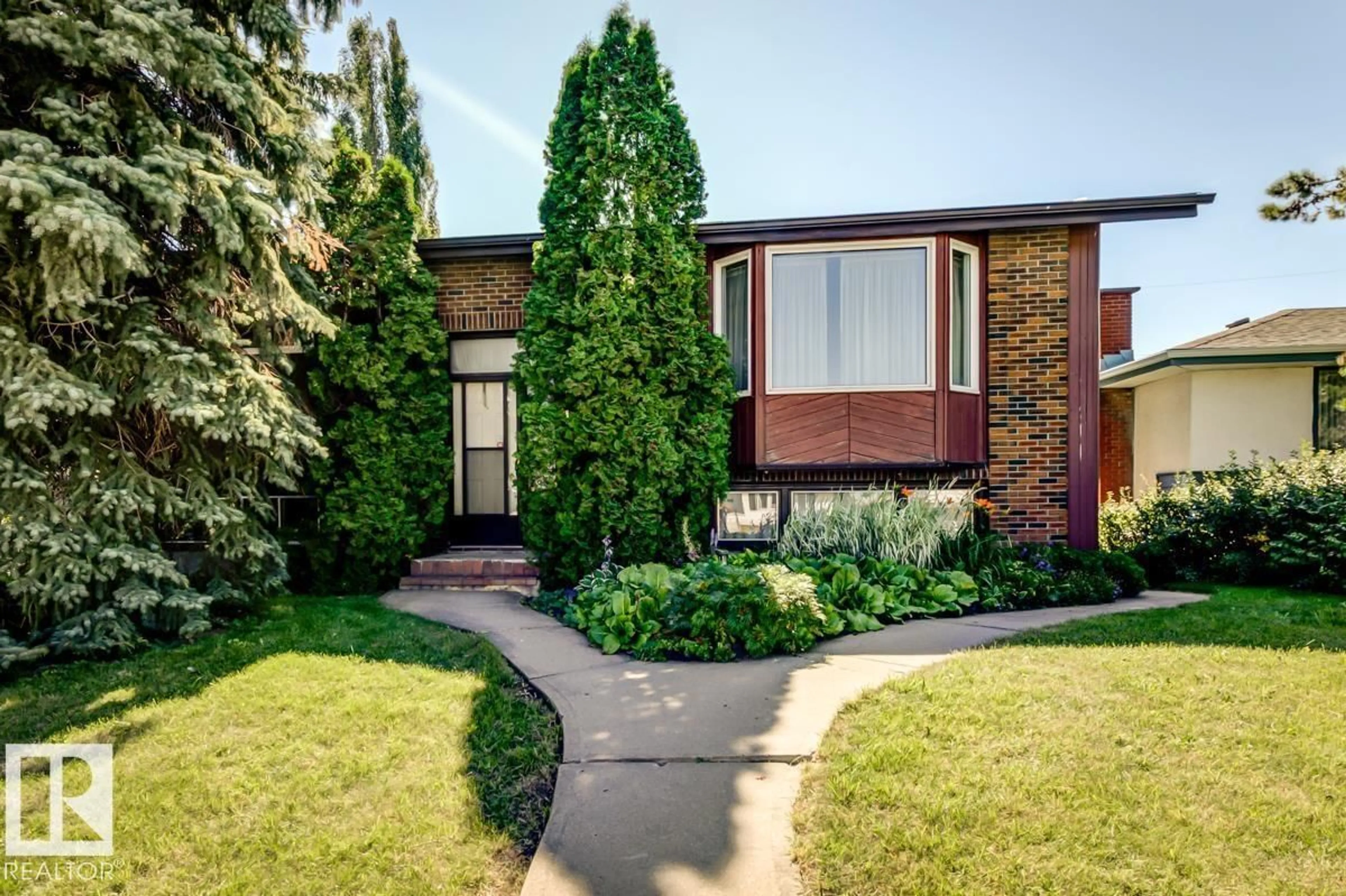 Home with brick exterior material, street for 5811 92 AV, Edmonton Alberta T6B2G9