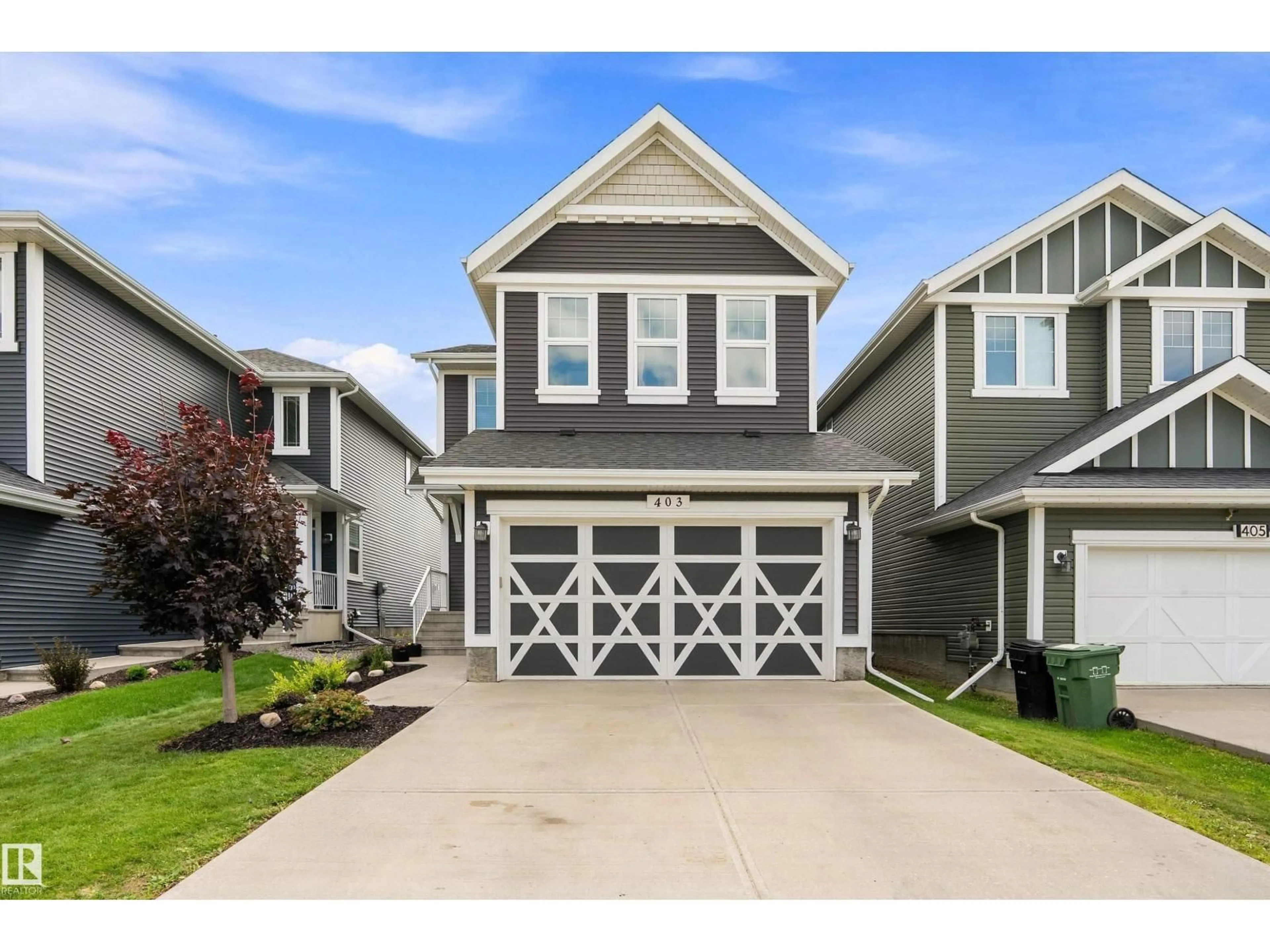 Home with vinyl exterior material, street for 403 SIMPKINS WD, Leduc Alberta T9E0Y3