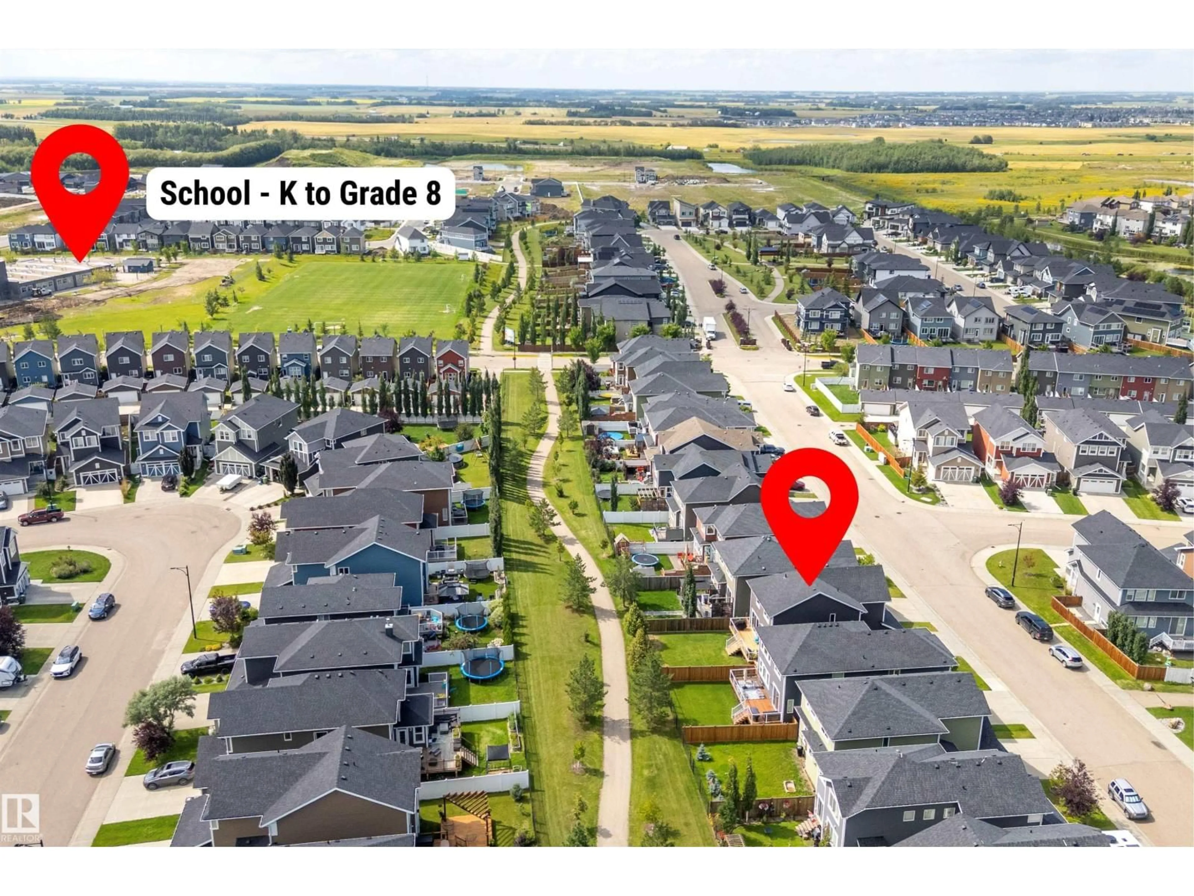 A pic from outside/outdoor area/front of a property/back of a property/a pic from drone, street for 403 SIMPKINS WD, Leduc Alberta T9E0Y3