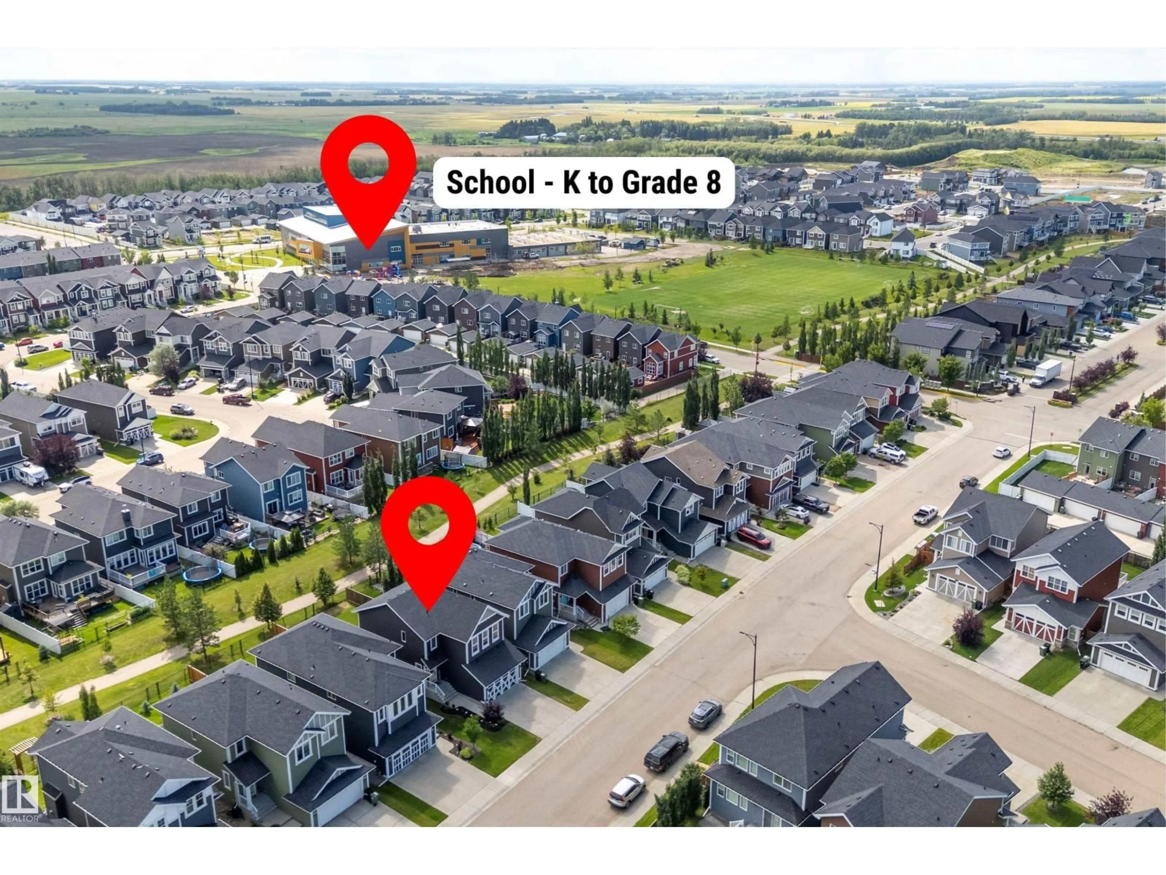 A pic from outside/outdoor area/front of a property/back of a property/a pic from drone, street for 403 SIMPKINS WD, Leduc Alberta T9E0Y3