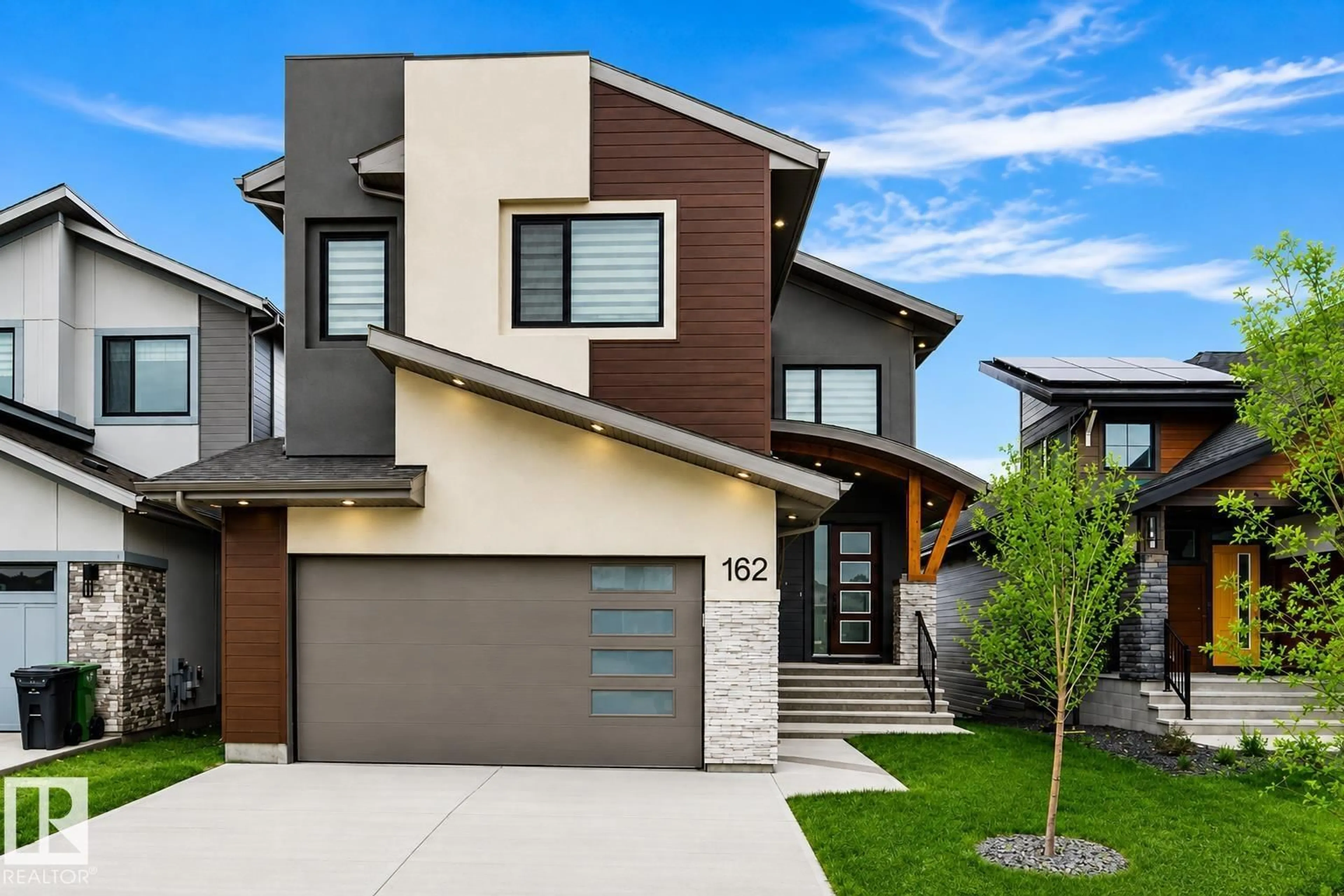 Home with vinyl exterior material, street for 162 EDGEWATER CI, Leduc Alberta T9E1K5