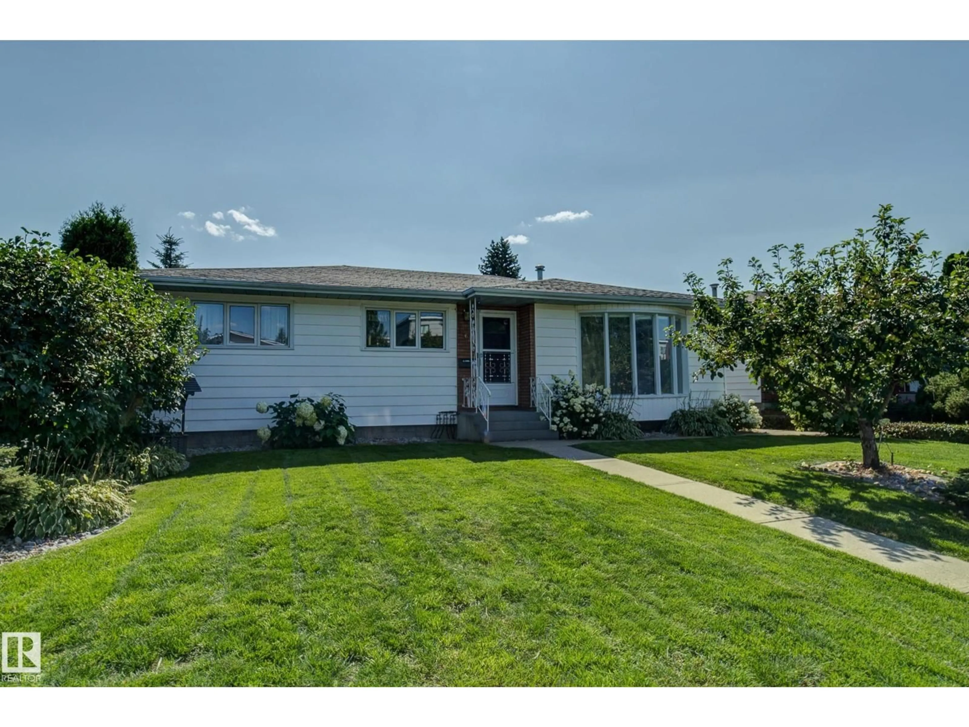 Home with vinyl exterior material, street for 11623 49 AV, Edmonton Alberta T6H0G9