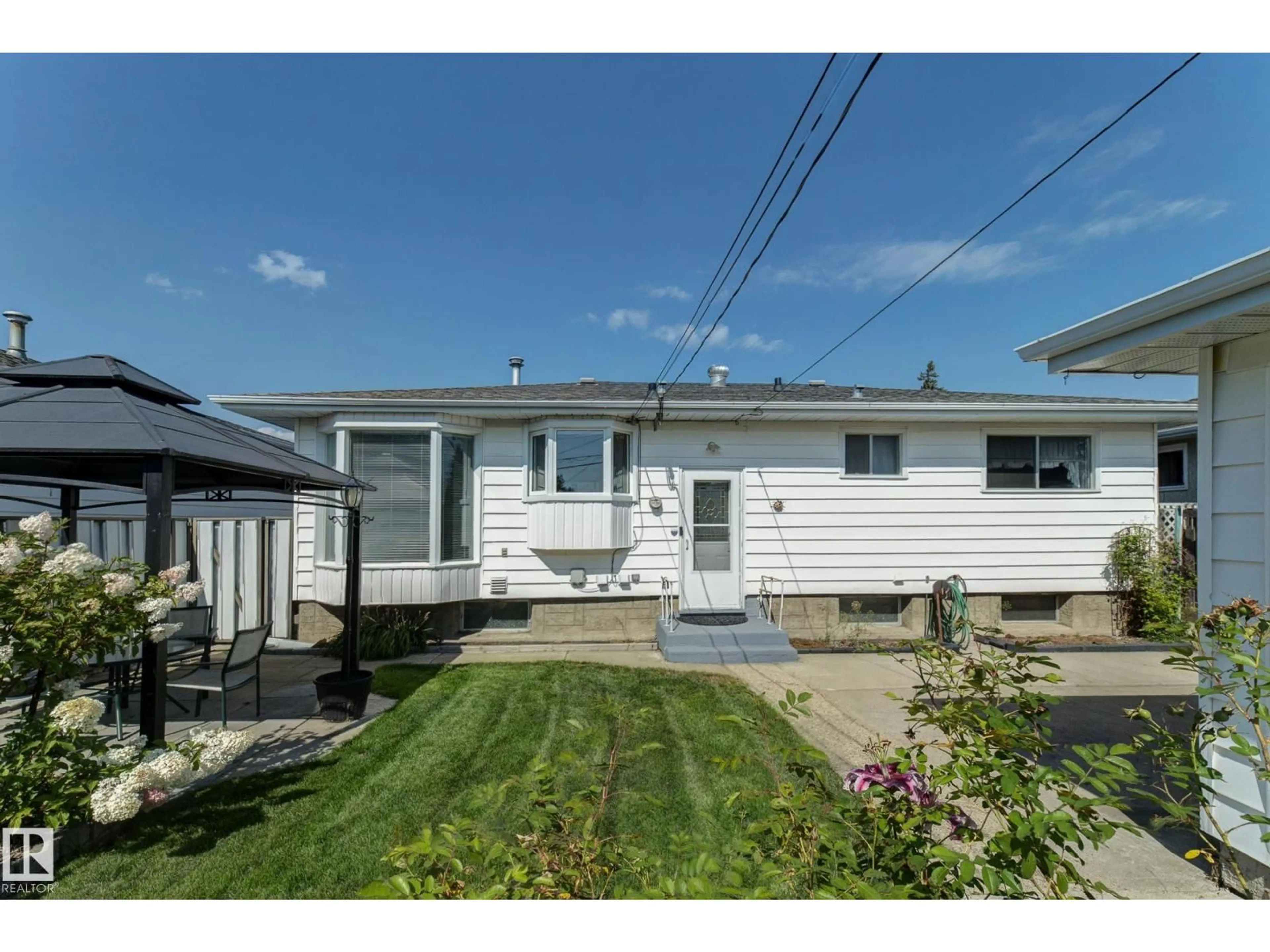 Home with vinyl exterior material, street for 11623 49 AV, Edmonton Alberta T6H0G9
