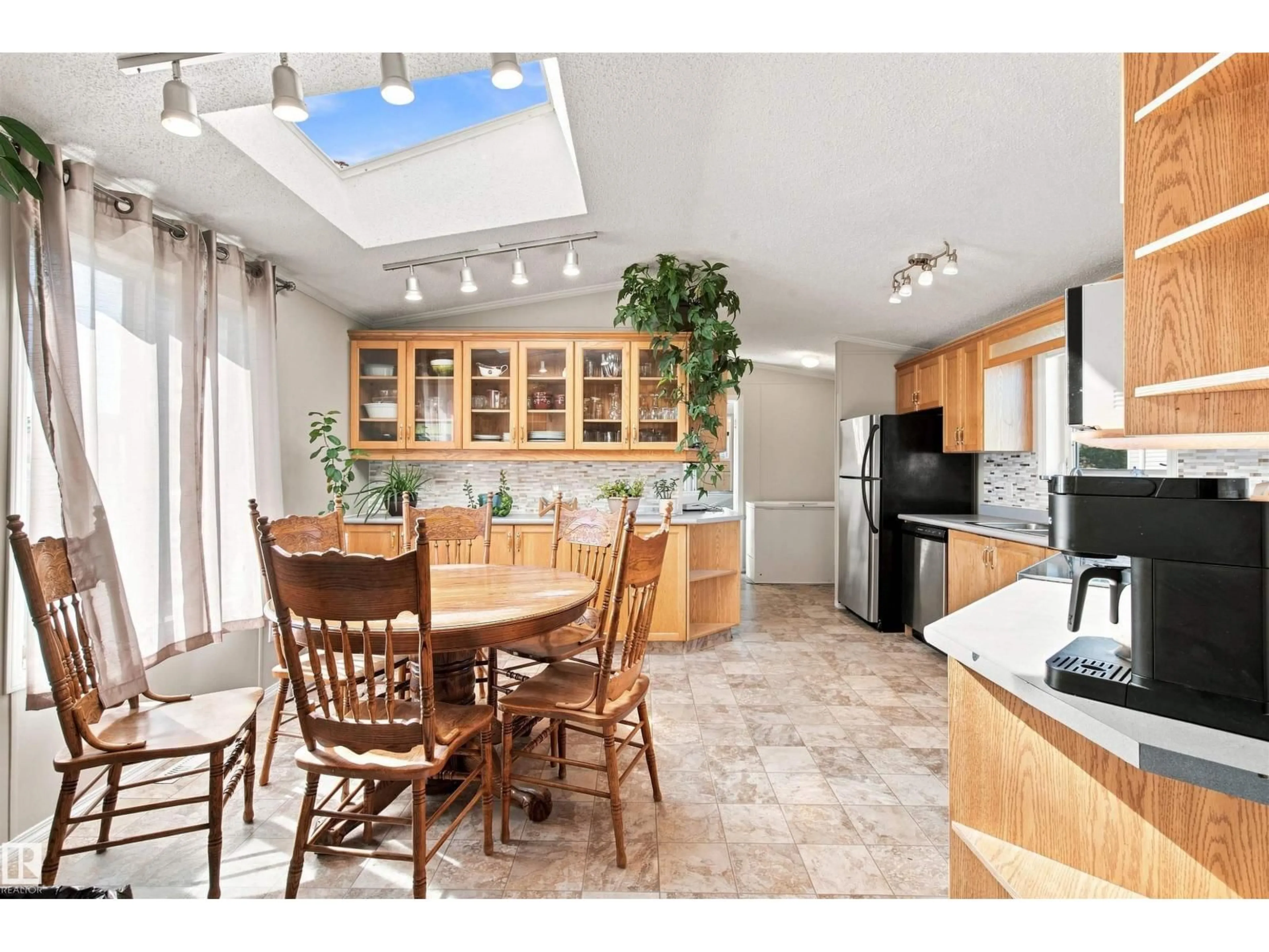 Open concept kitchen, ceramic/tile floor for 89 5508 55 ST, Bonnyville Town Alberta T9N2B6