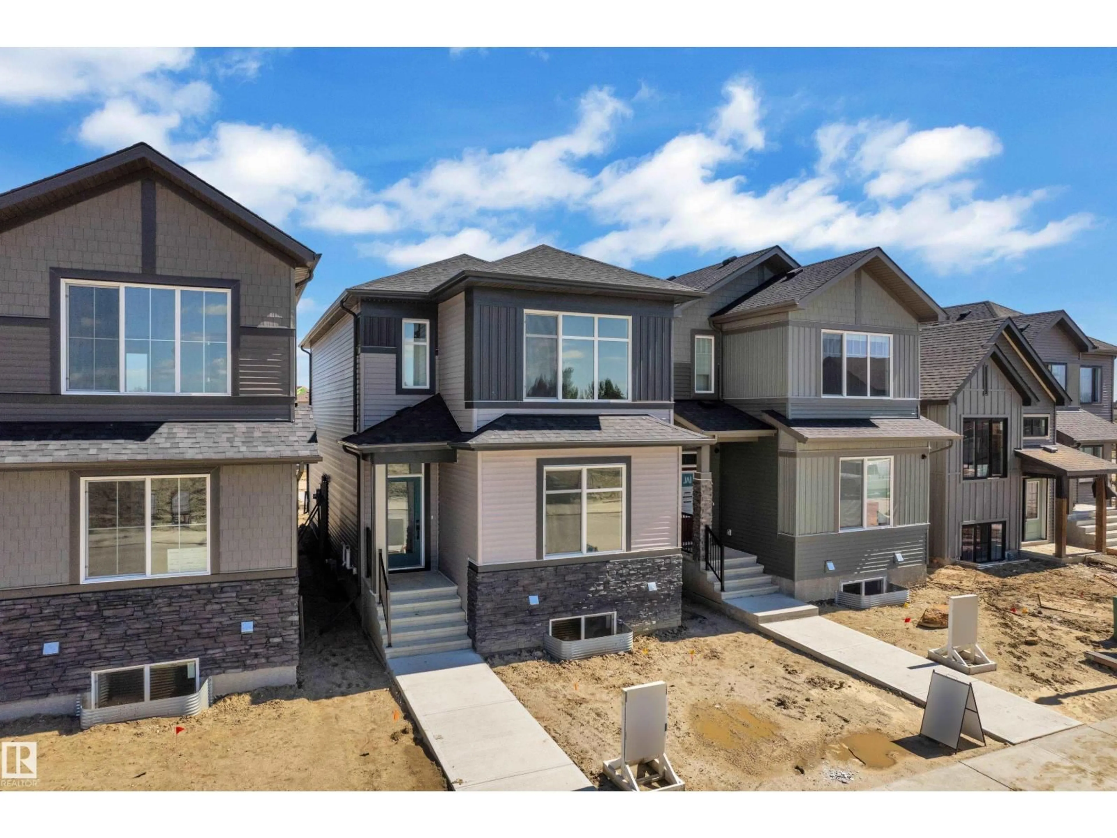 Home with vinyl exterior material, street for 213 FALCON CRESCENT, Leduc Alberta T9E1V2