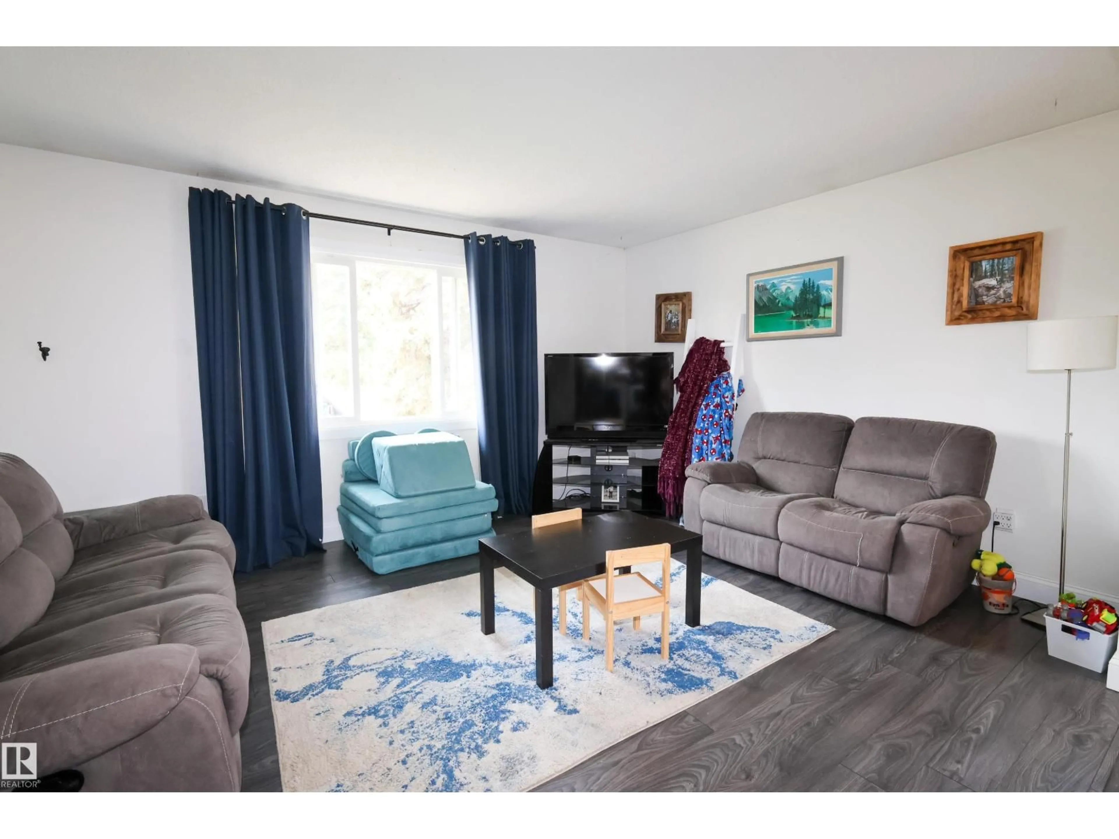 Living room with furniture, unknown for 4811 50 ST, Legal Alberta T0G1L0