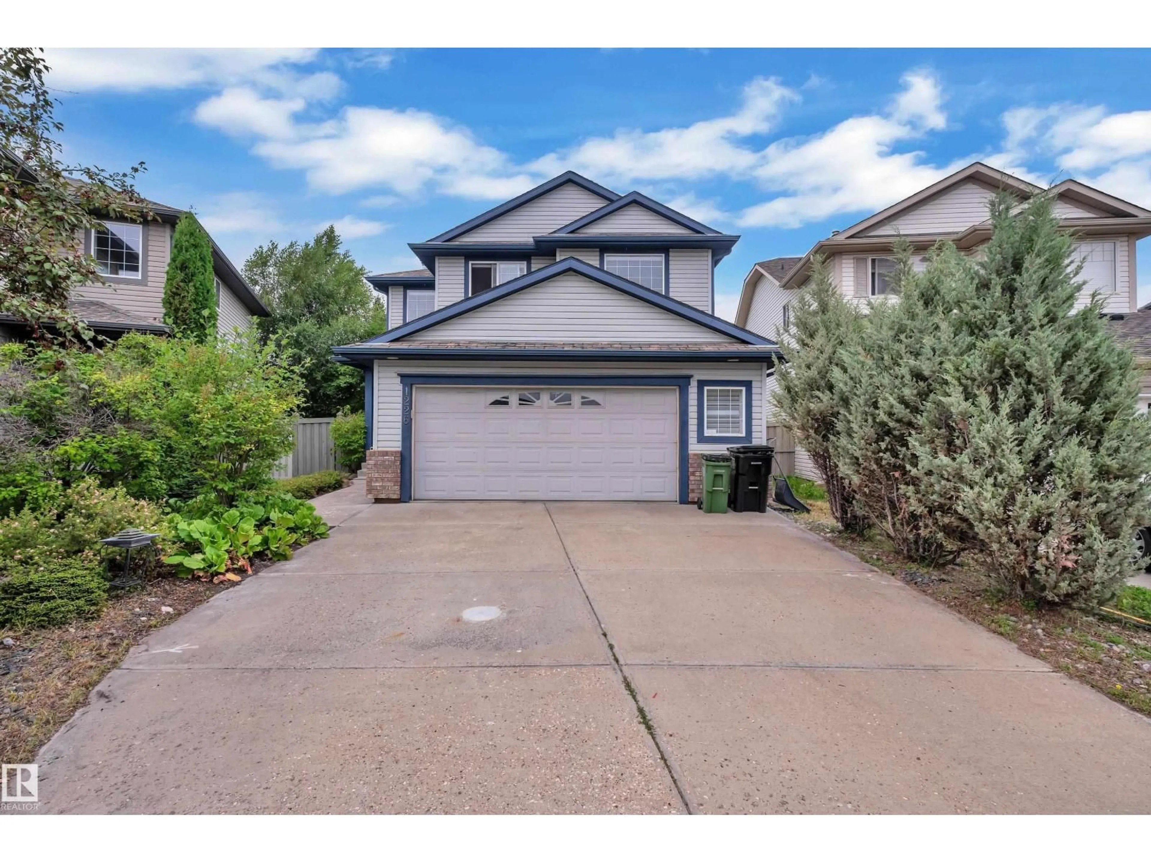 Home with vinyl exterior material, street for 1226 MCALLISTER WY, Edmonton Alberta T6W1X7