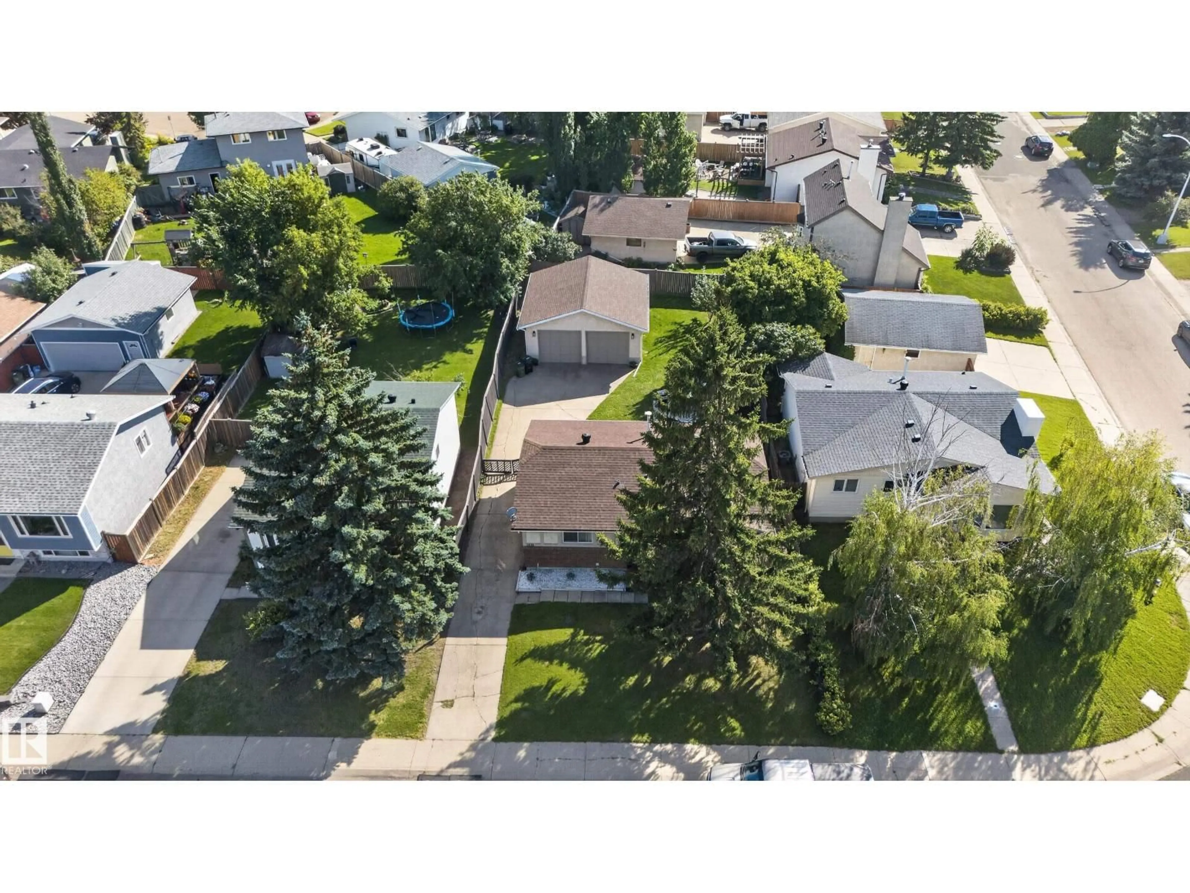 A pic from outside/outdoor area/front of a property/back of a property/a pic from drone, street for 1931 145A AV, Edmonton Alberta T5Y1S9