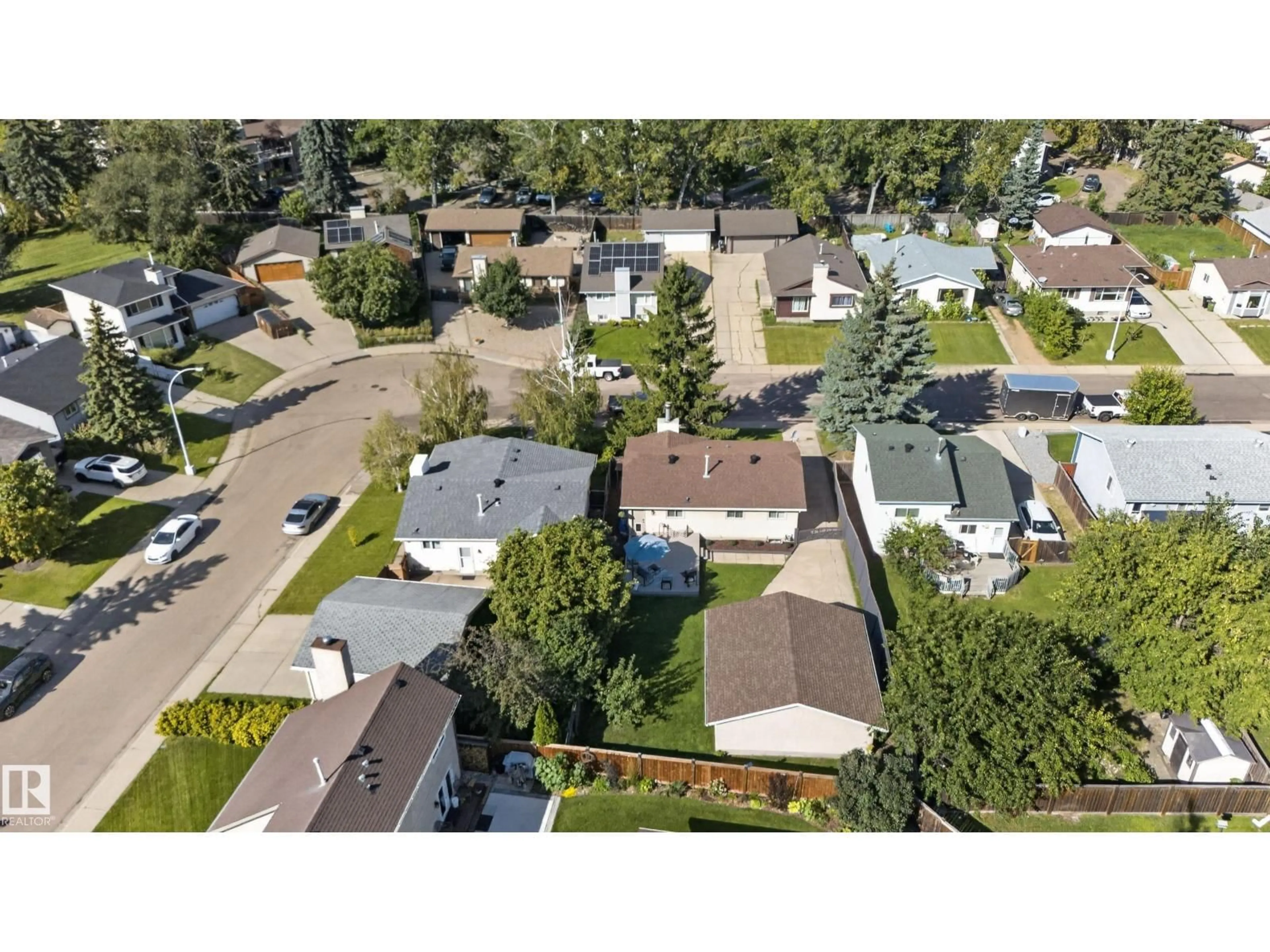 A pic from outside/outdoor area/front of a property/back of a property/a pic from drone, street for 1931 145A AV, Edmonton Alberta T5Y1S9