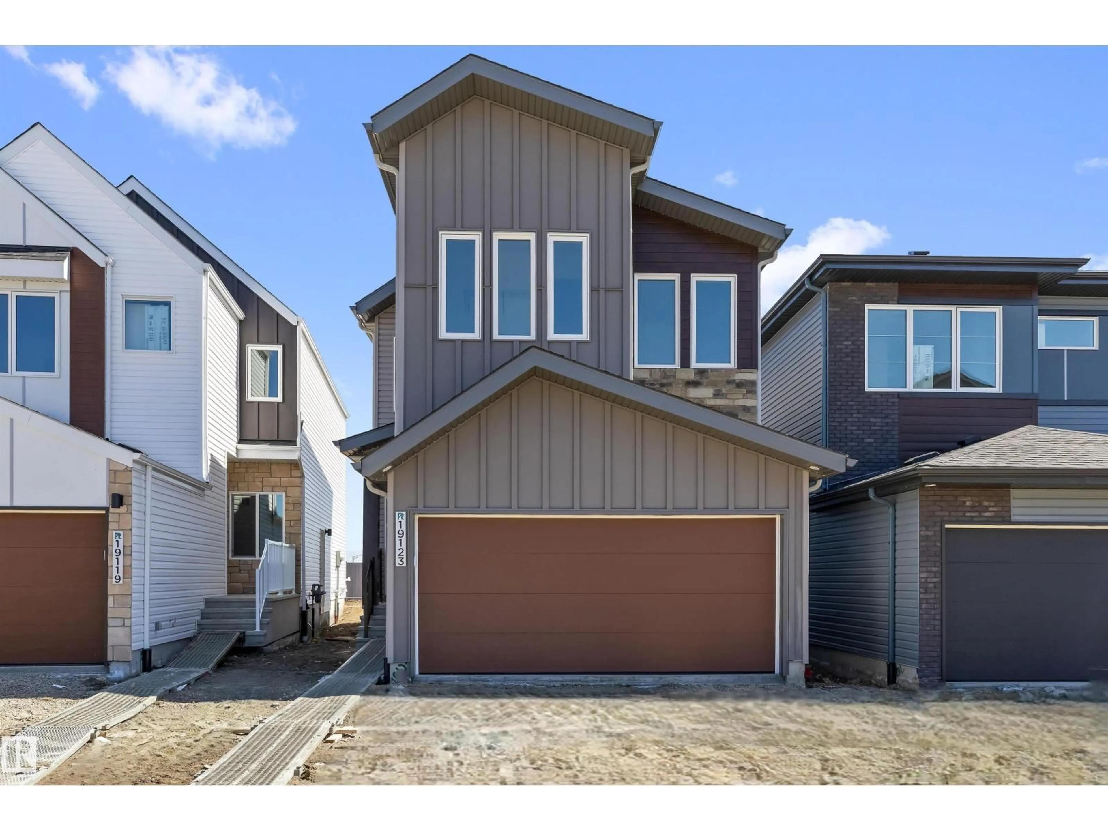 Home with vinyl exterior material, street for 19123 20 AV, Edmonton Alberta T6M3E8