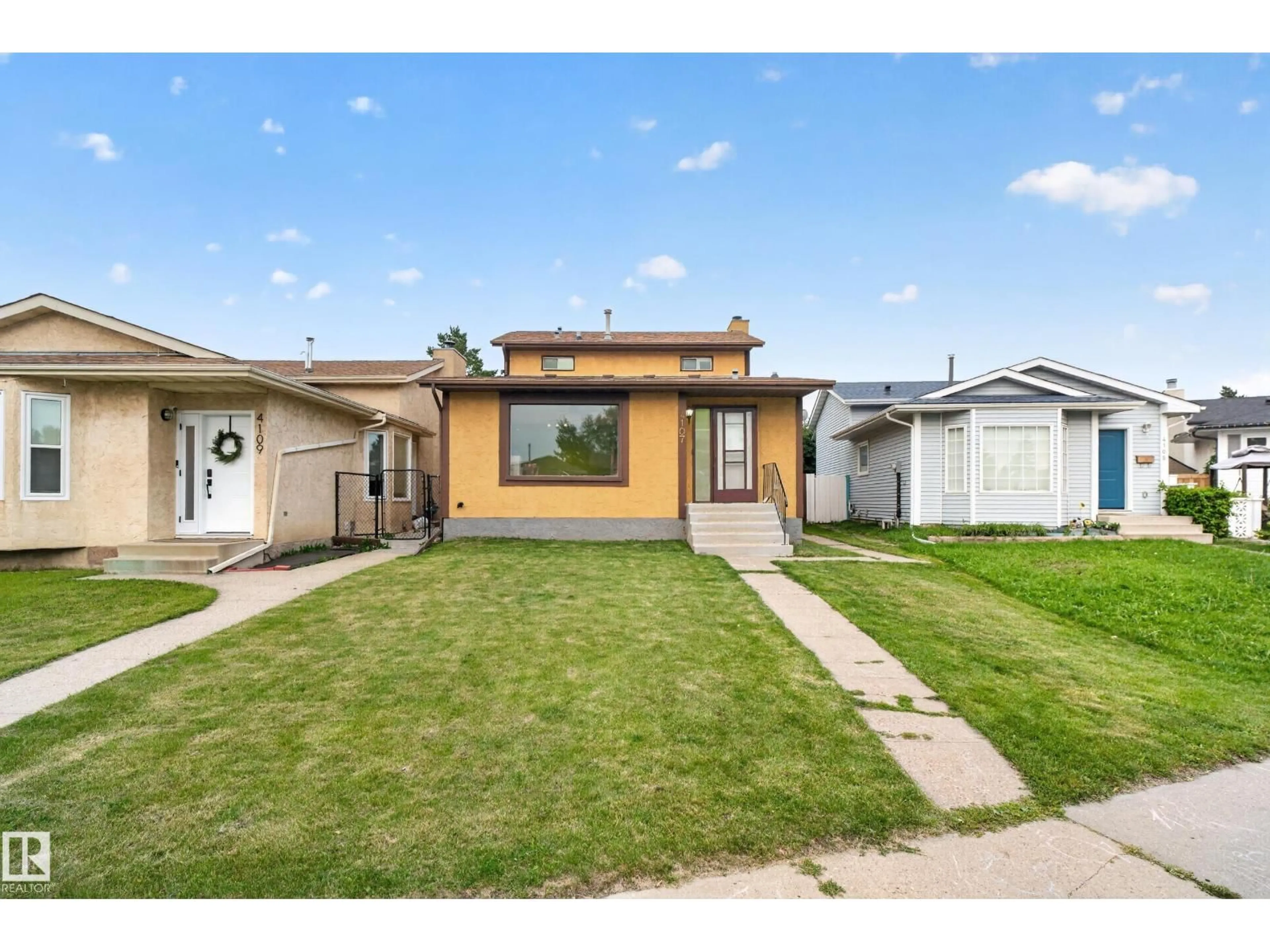 Home with vinyl exterior material, street for 4107 35 ST, Edmonton Alberta T6L5V5