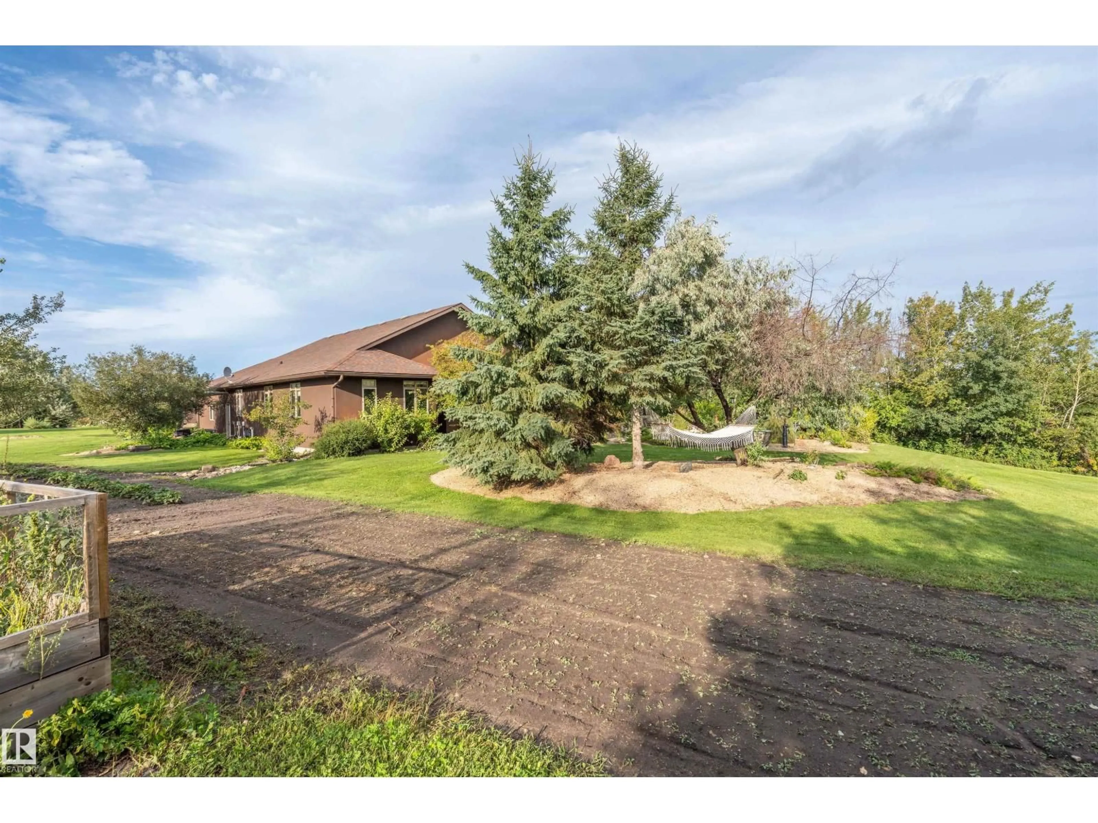 A pic from outside/outdoor area/front of a property/back of a property/a pic from drone, unknown for 61130 - 9 RR 465, Rural Bonnyville M.D. Alberta T9N2G5