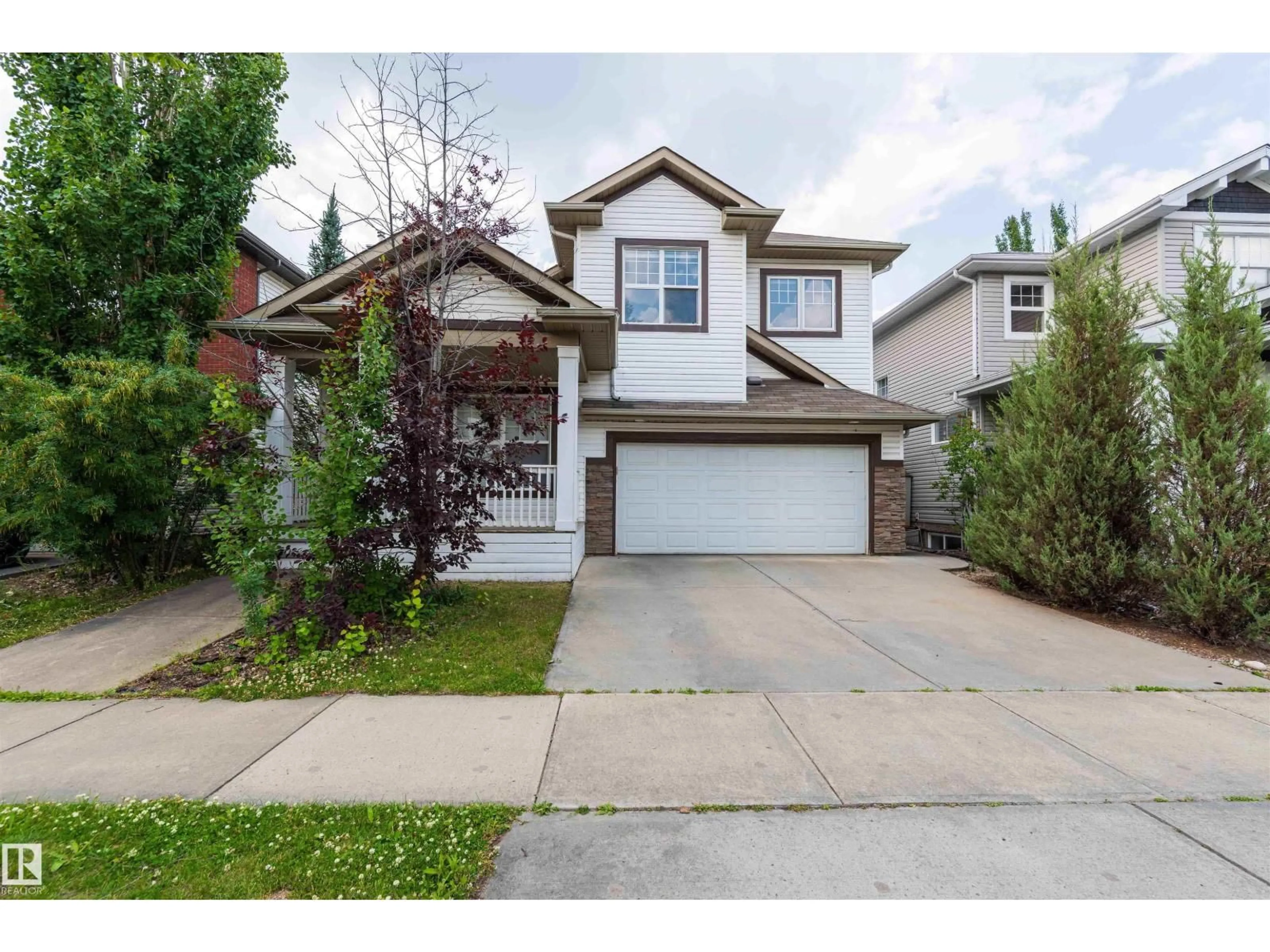 Home with vinyl exterior material, street for 5092 THIBAULT WY, Edmonton Alberta T6R3J3