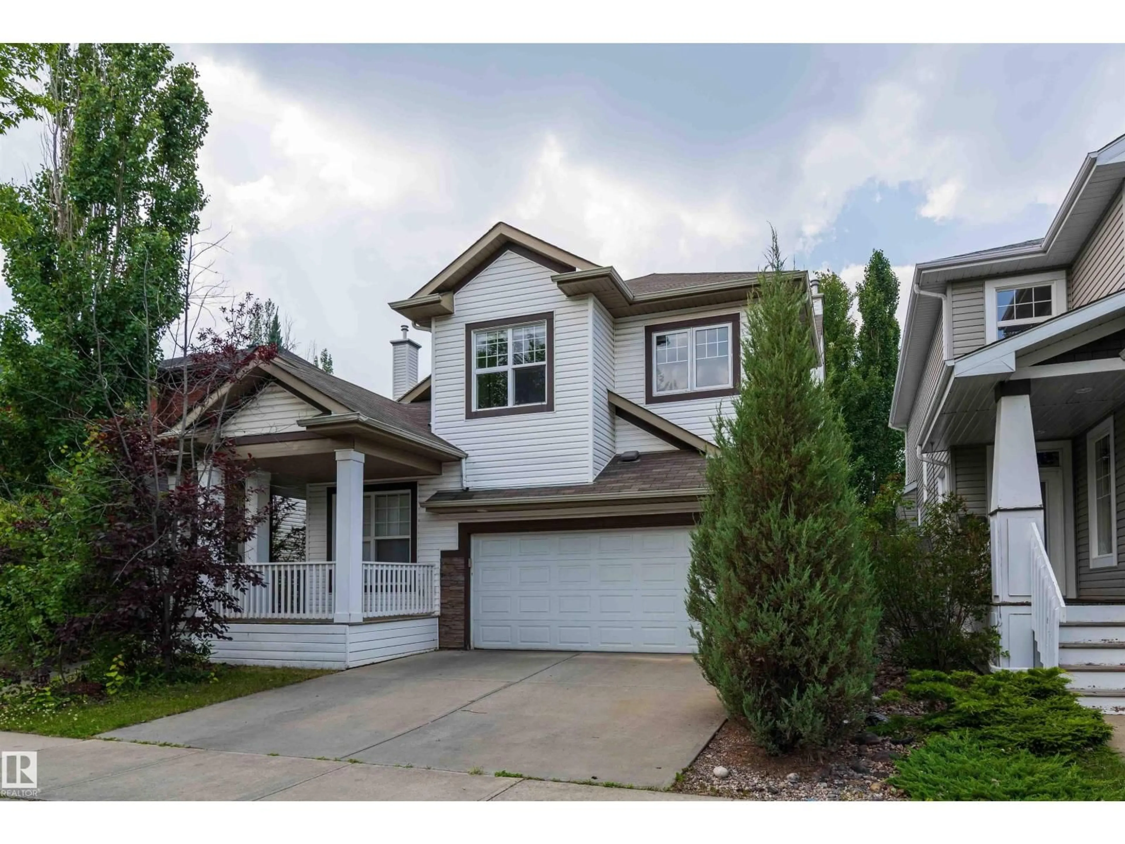 Home with vinyl exterior material, street for 5092 THIBAULT WY, Edmonton Alberta T6R3J3