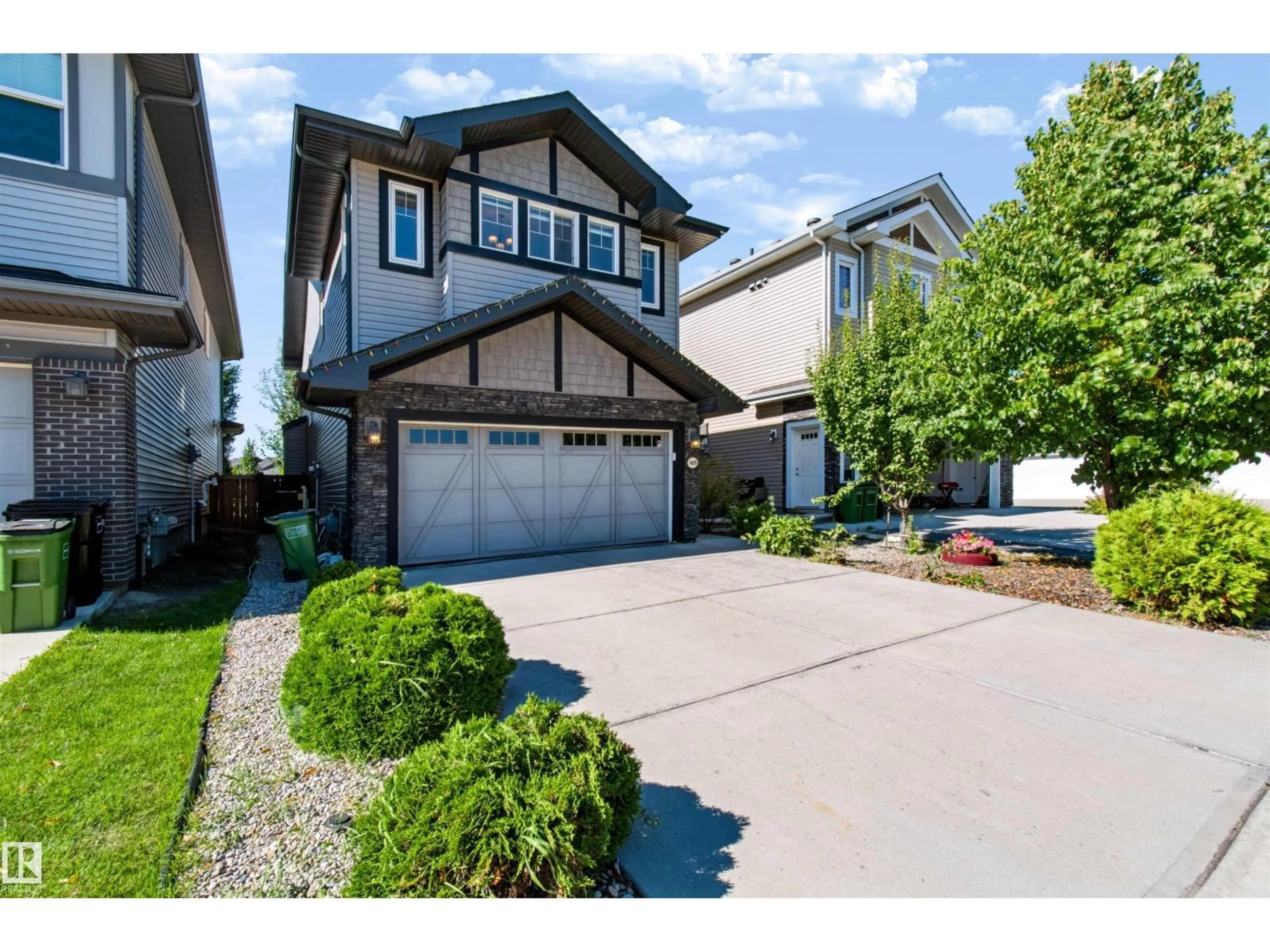 Home with vinyl exterior material, street for SW - 1420 158 ST, Edmonton Alberta T6T2S2