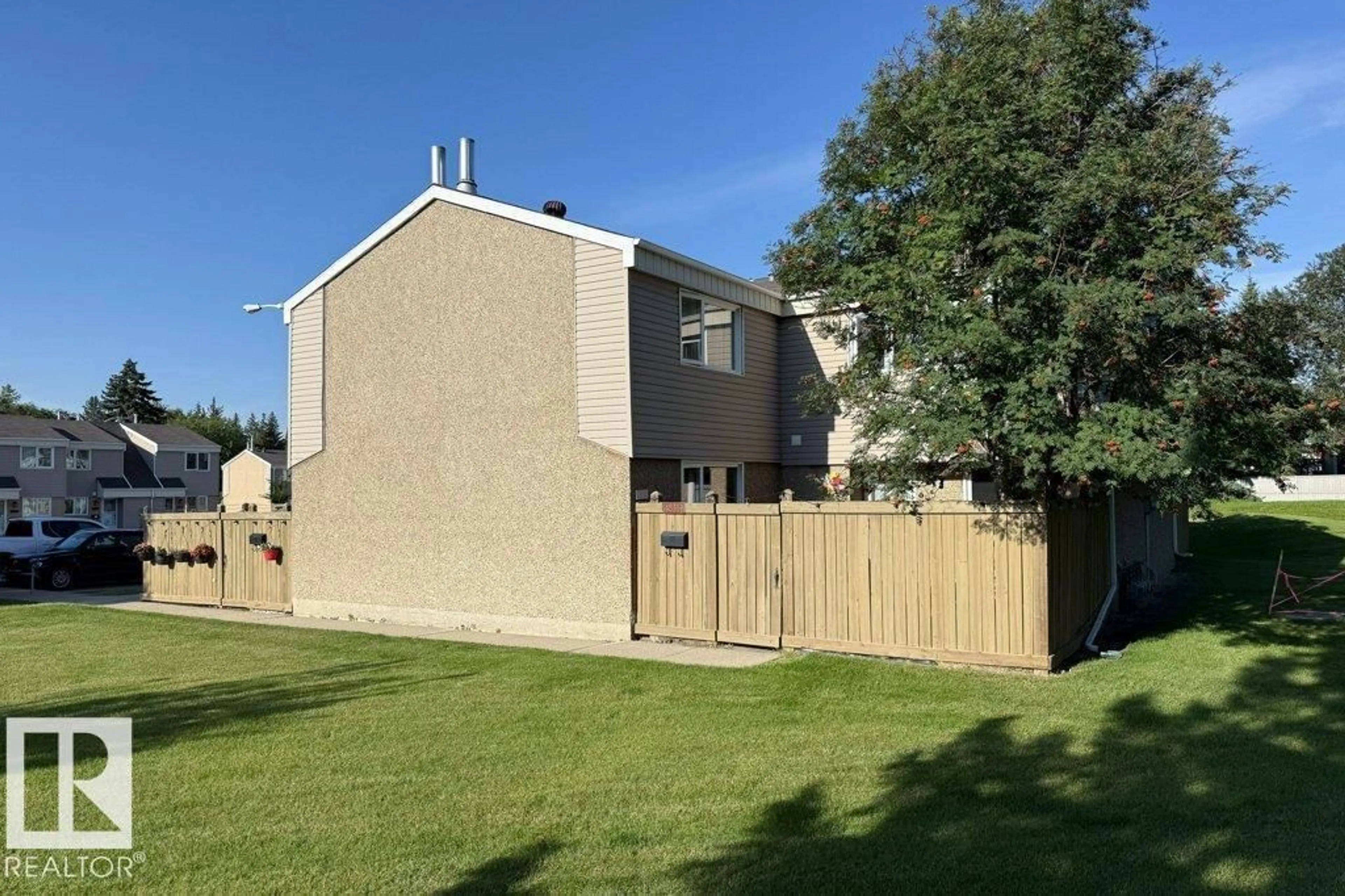 A pic from outside/outdoor area/front of a property/back of a property/a pic from drone, unknown for NW - 14835B RIVERBEND ROAD, Edmonton Alberta T6H5A9