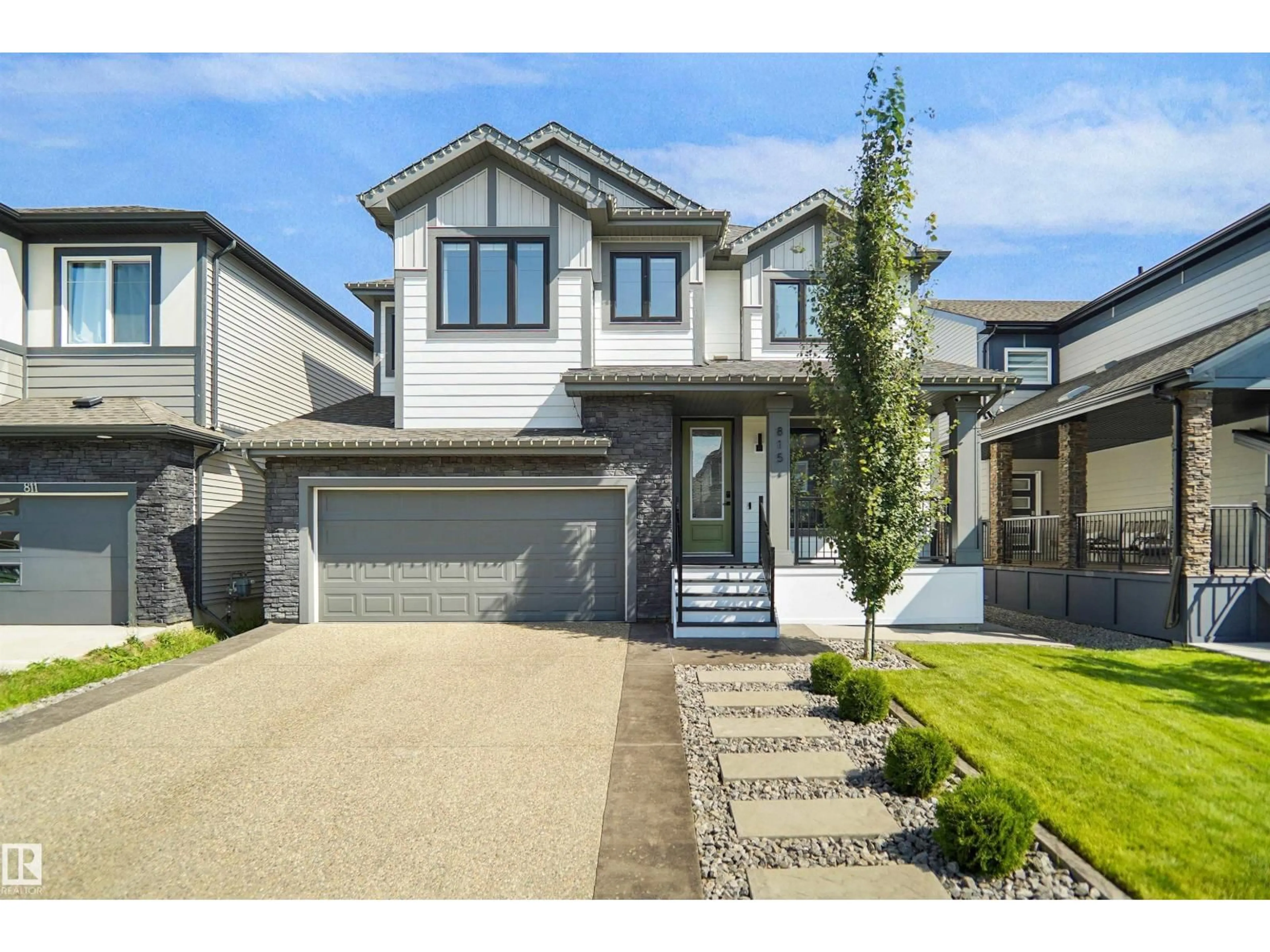 Home with vinyl exterior material, street for SW - 815 176 ST, Edmonton Alberta T6W2X3