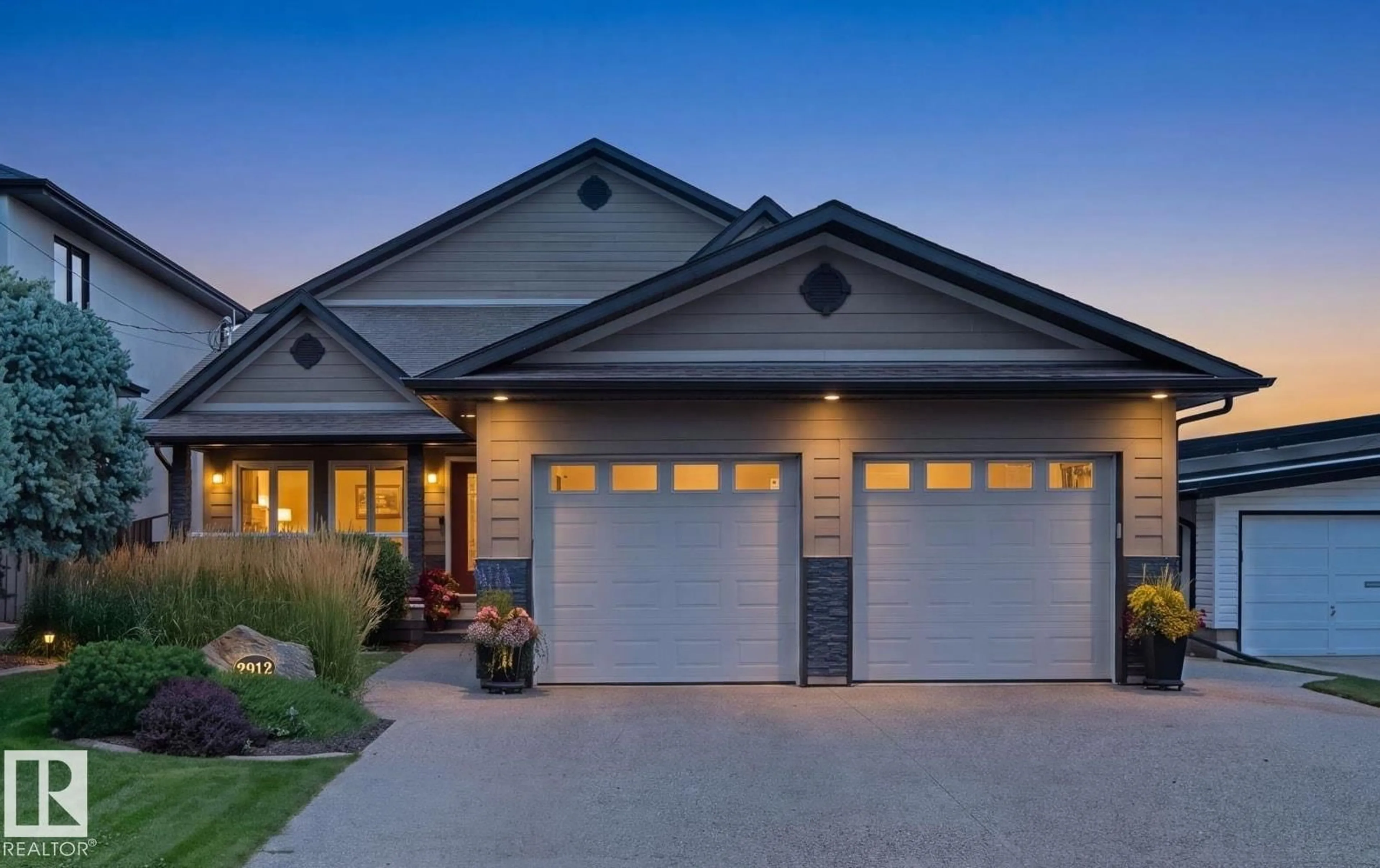 Home with vinyl exterior material, street for 7912 ROWLAND RD, Edmonton Alberta T6A3W1