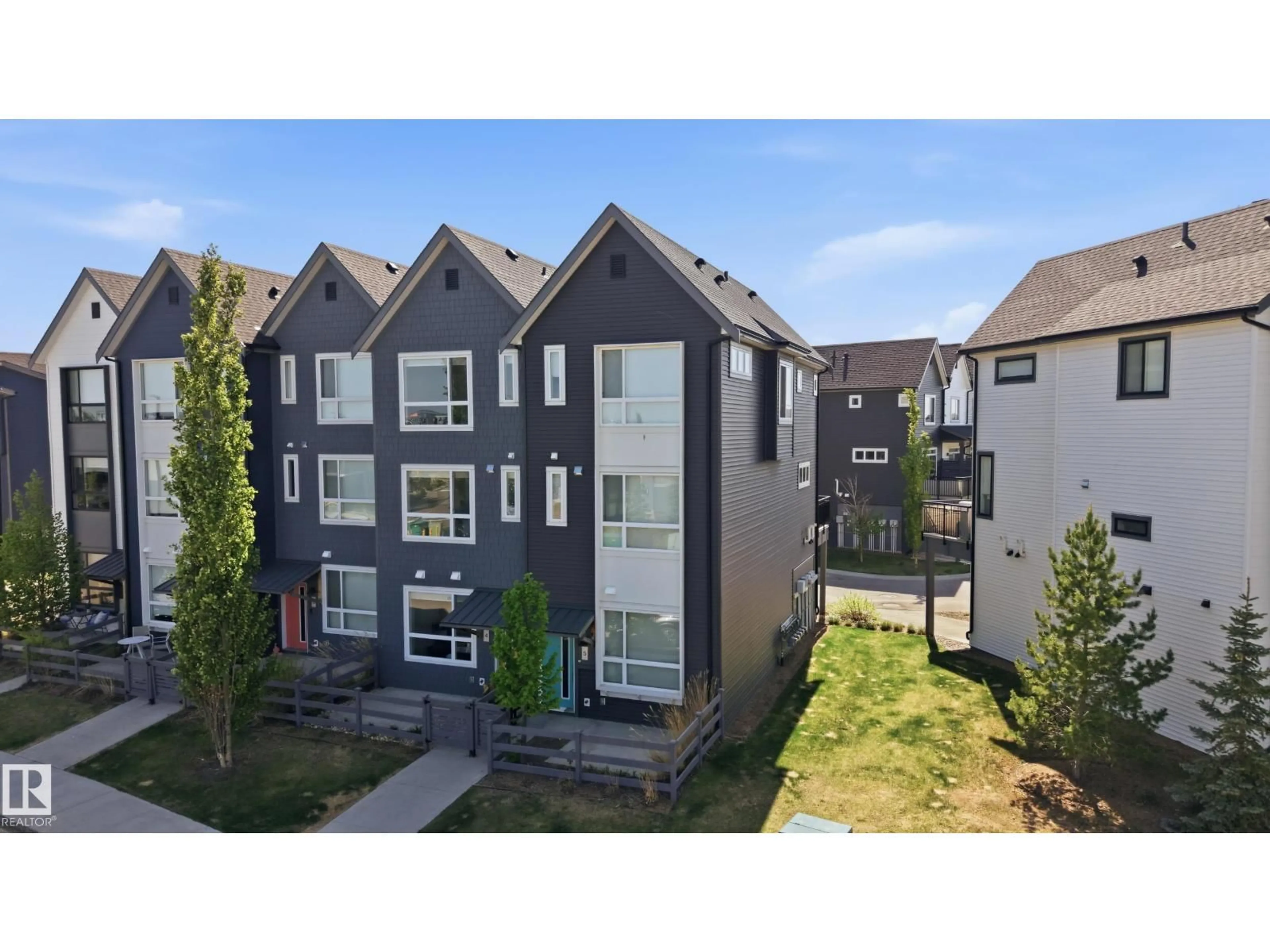 A pic from outside/outdoor area/front of a property/back of a property/a pic from drone, unknown for 5 - 100 JENSEN LAKES BV, St. Albert Alberta T8N7T9
