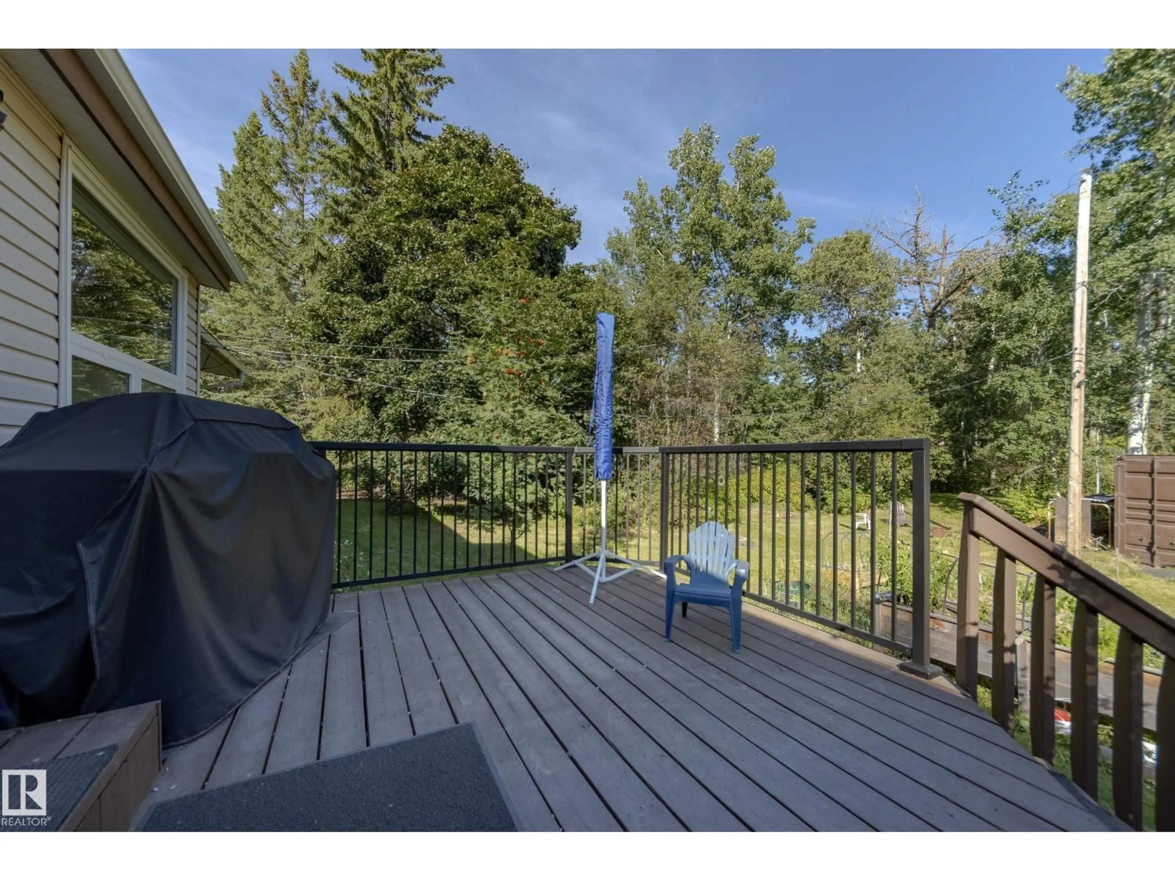 Patio, forest/trees view for 253 - 52313 RGE ROAD 232, Rural Strathcona County Alberta T8B1B7