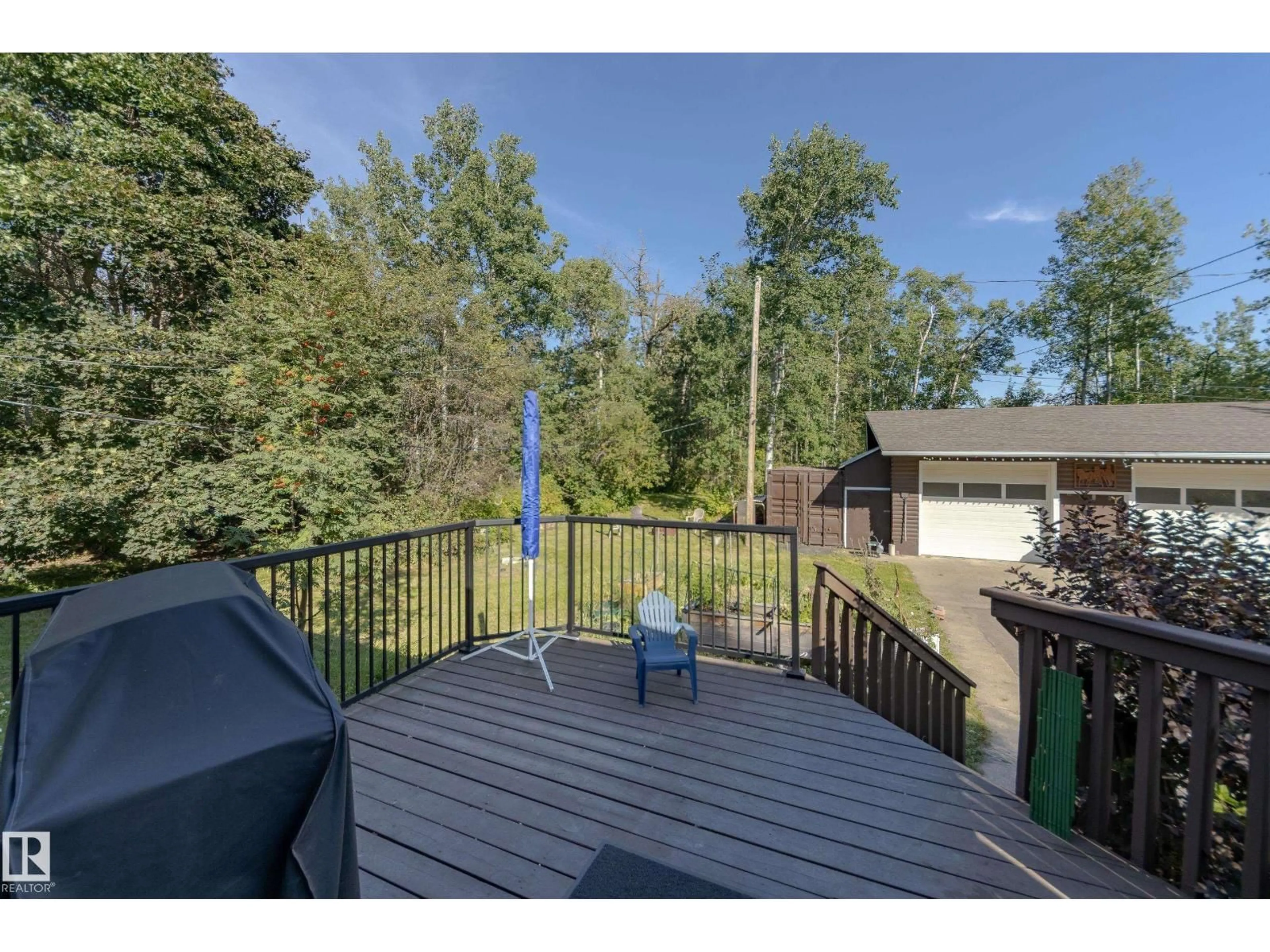 A pic from outside/outdoor area/front of a property/back of a property/a pic from drone, water/lake/river/ocean view for 253 - 52313 RGE ROAD 232, Rural Strathcona County Alberta T8B1B7