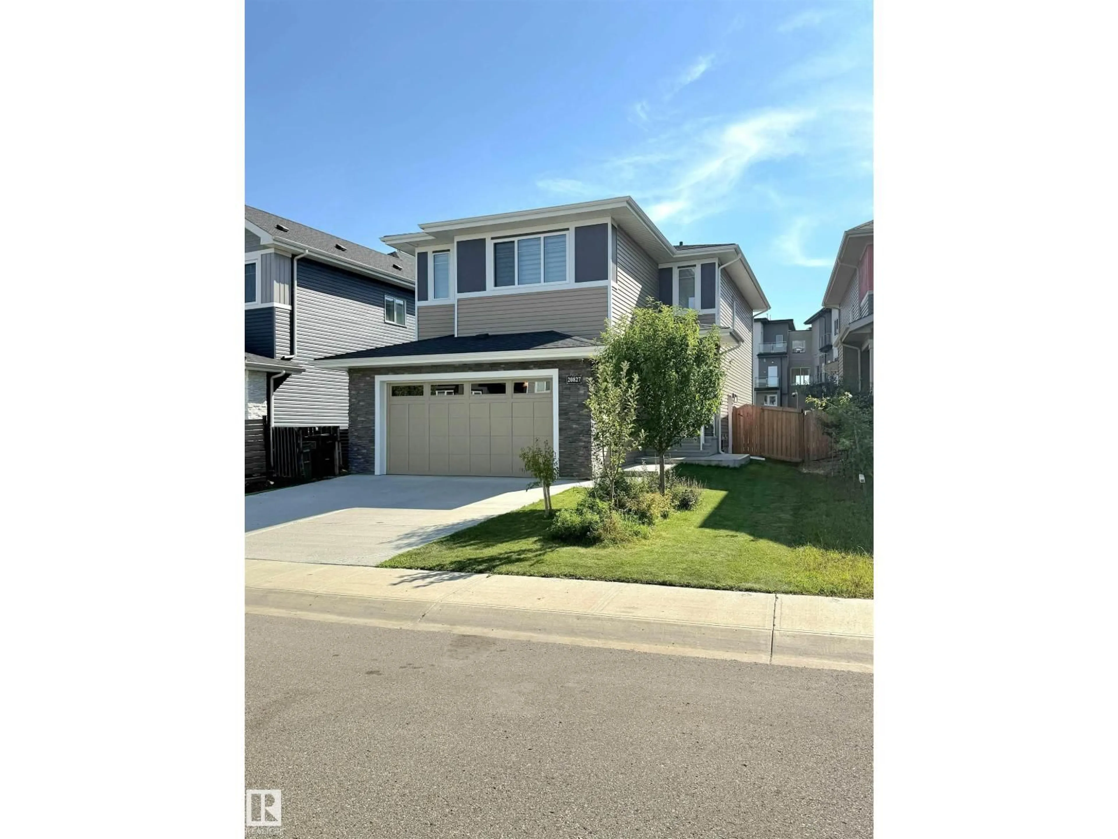 Home with vinyl exterior material, street for 20827 130 AV, Edmonton Alberta T5S0L4