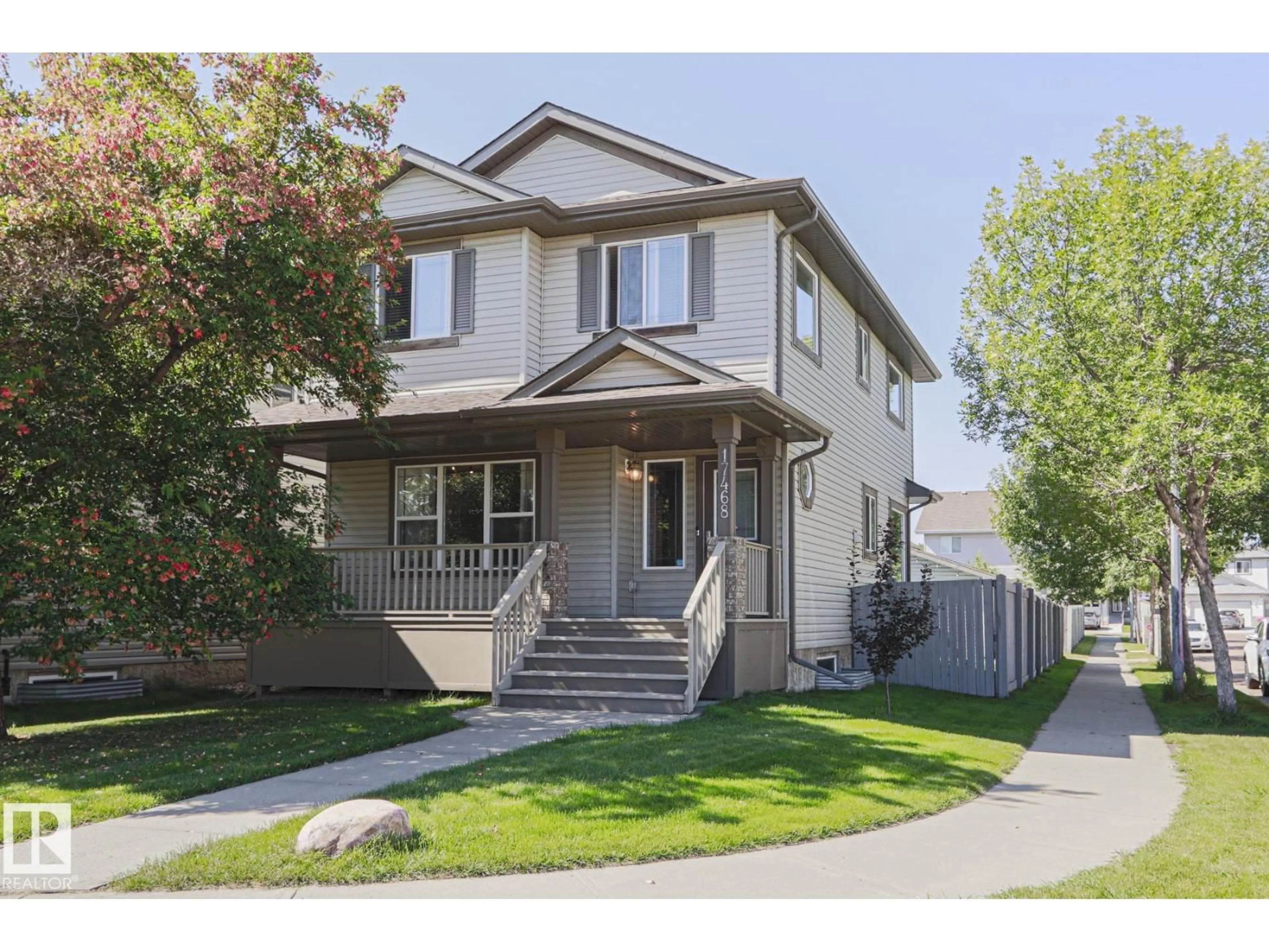 Home with vinyl exterior material, street for 17468 89 ST, Edmonton Alberta T5Z3X9