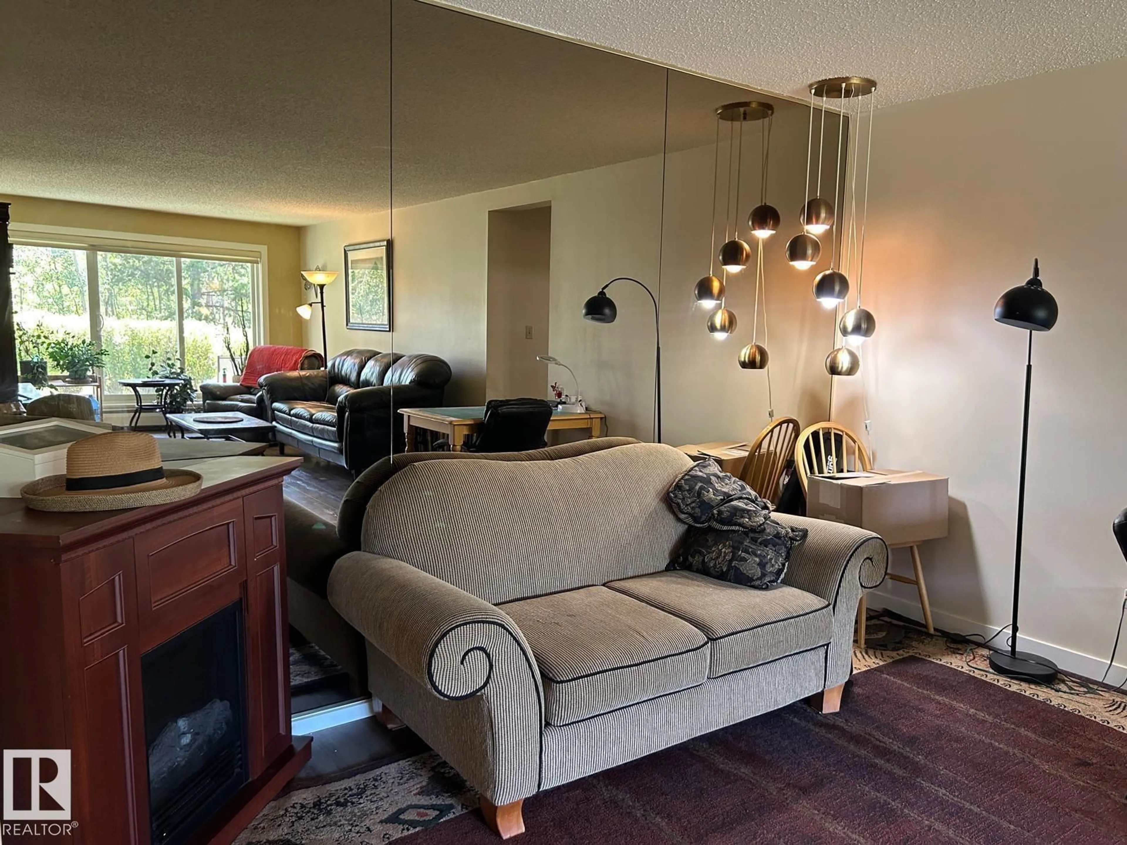 Living room with furniture, unknown for #112 - 4404 122 ST, Edmonton Alberta T6J4A9