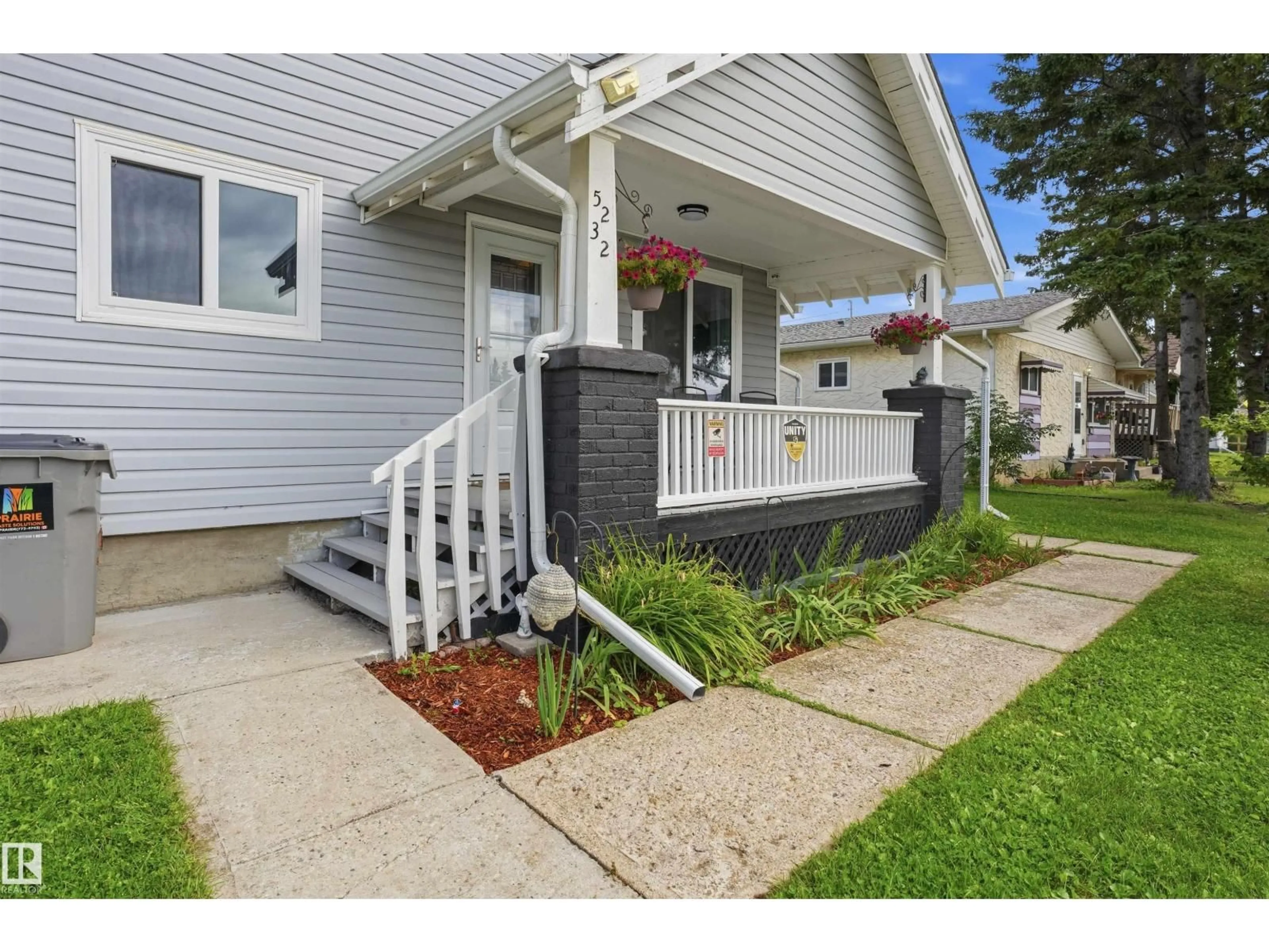 Home with vinyl exterior material, street for 5232 51 AV, Mundare Alberta T0B3H0