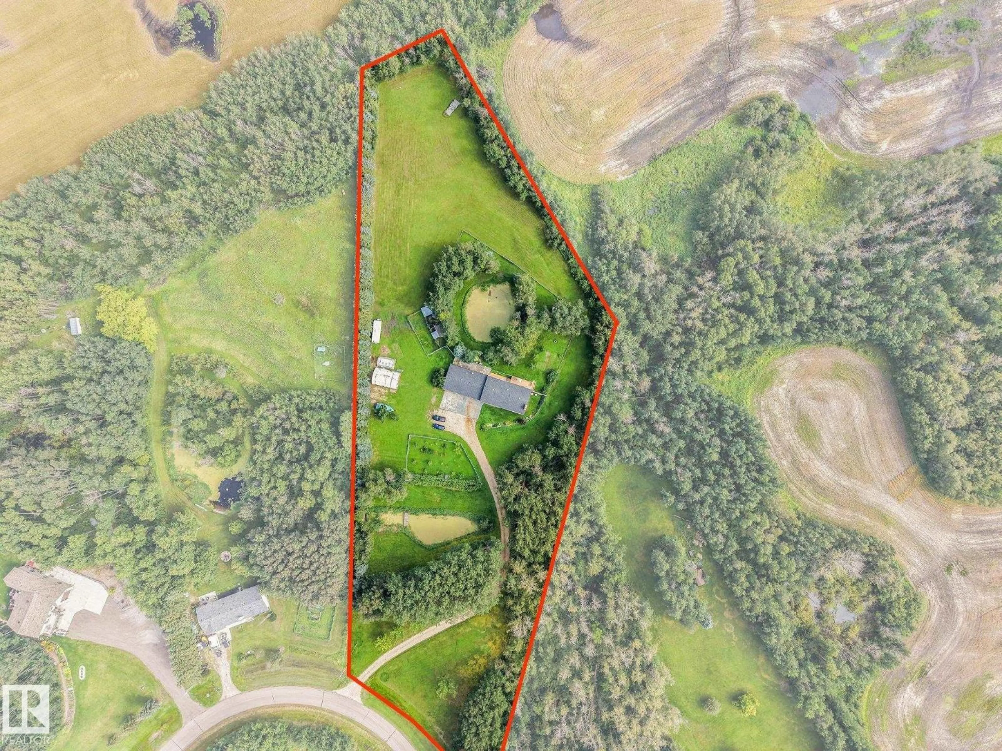 A pic from outside/outdoor area/front of a property/back of a property/a pic from drone, unknown for 193 53111 RGE ROAD 220, Rural Strathcona County Alberta T8E2C6