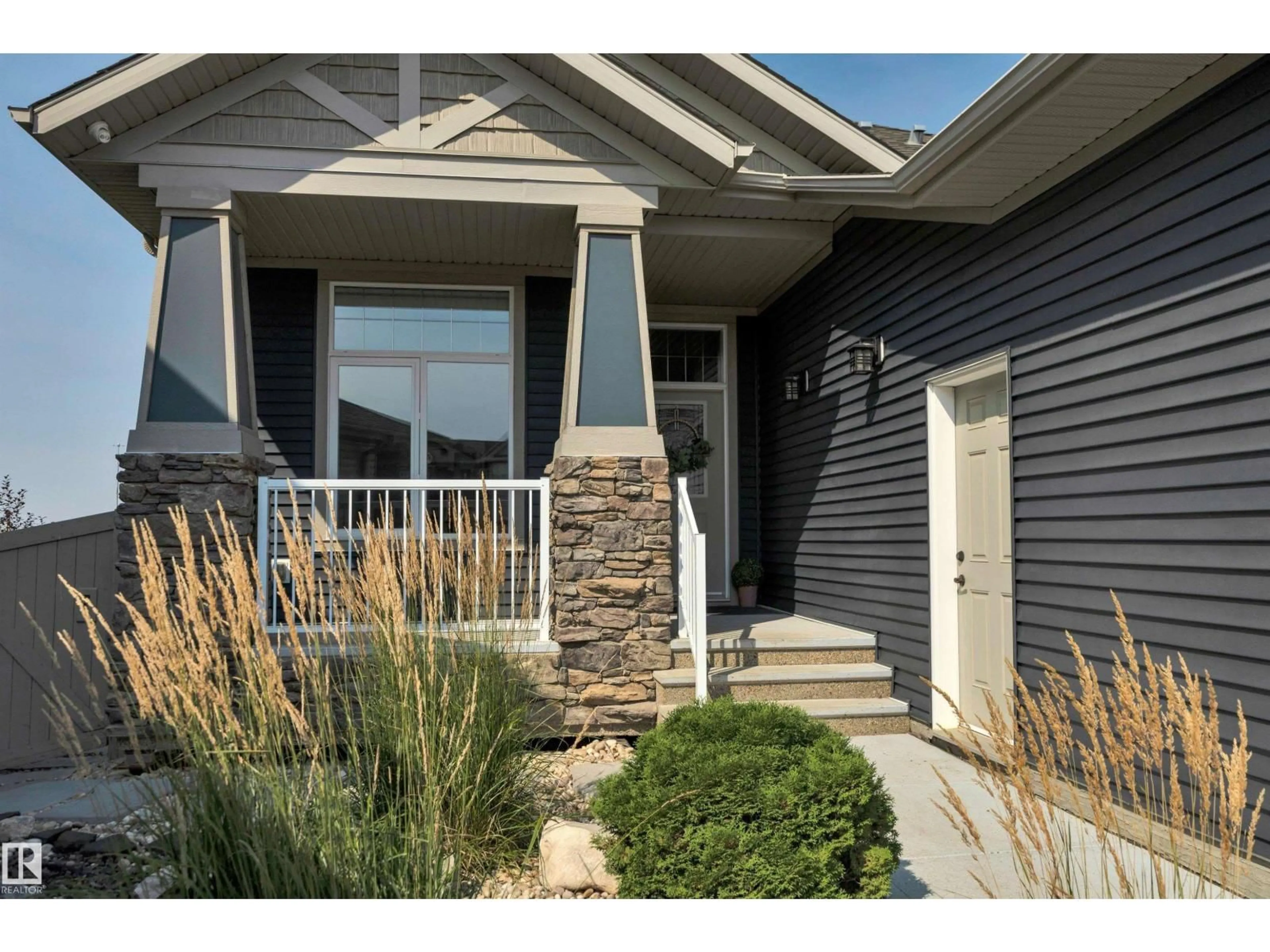 Home with vinyl exterior material, street for 4232 8 ST, Edmonton Alberta T6T0W7