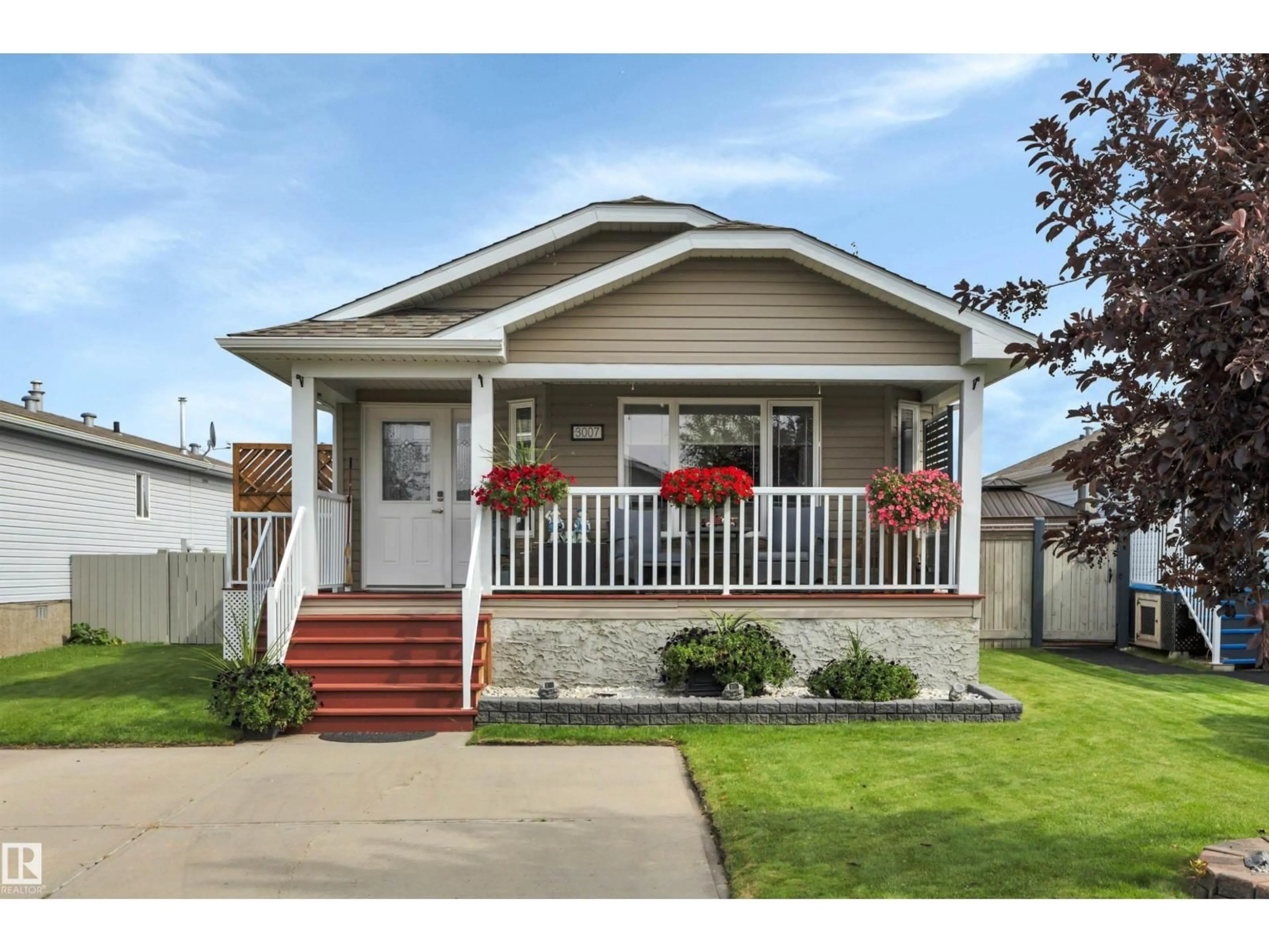 Home with vinyl exterior material, street for 3007 ASPEN WD, Leduc Alberta T9E8R5