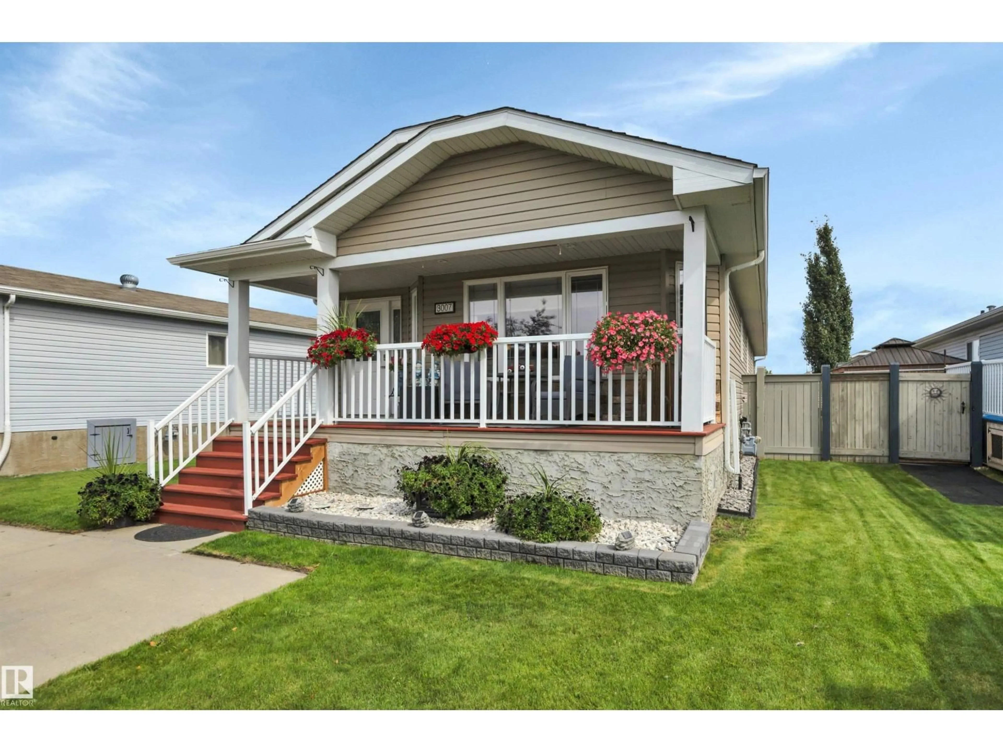 Home with vinyl exterior material, street for 3007 ASPEN WD, Leduc Alberta T9E8R5