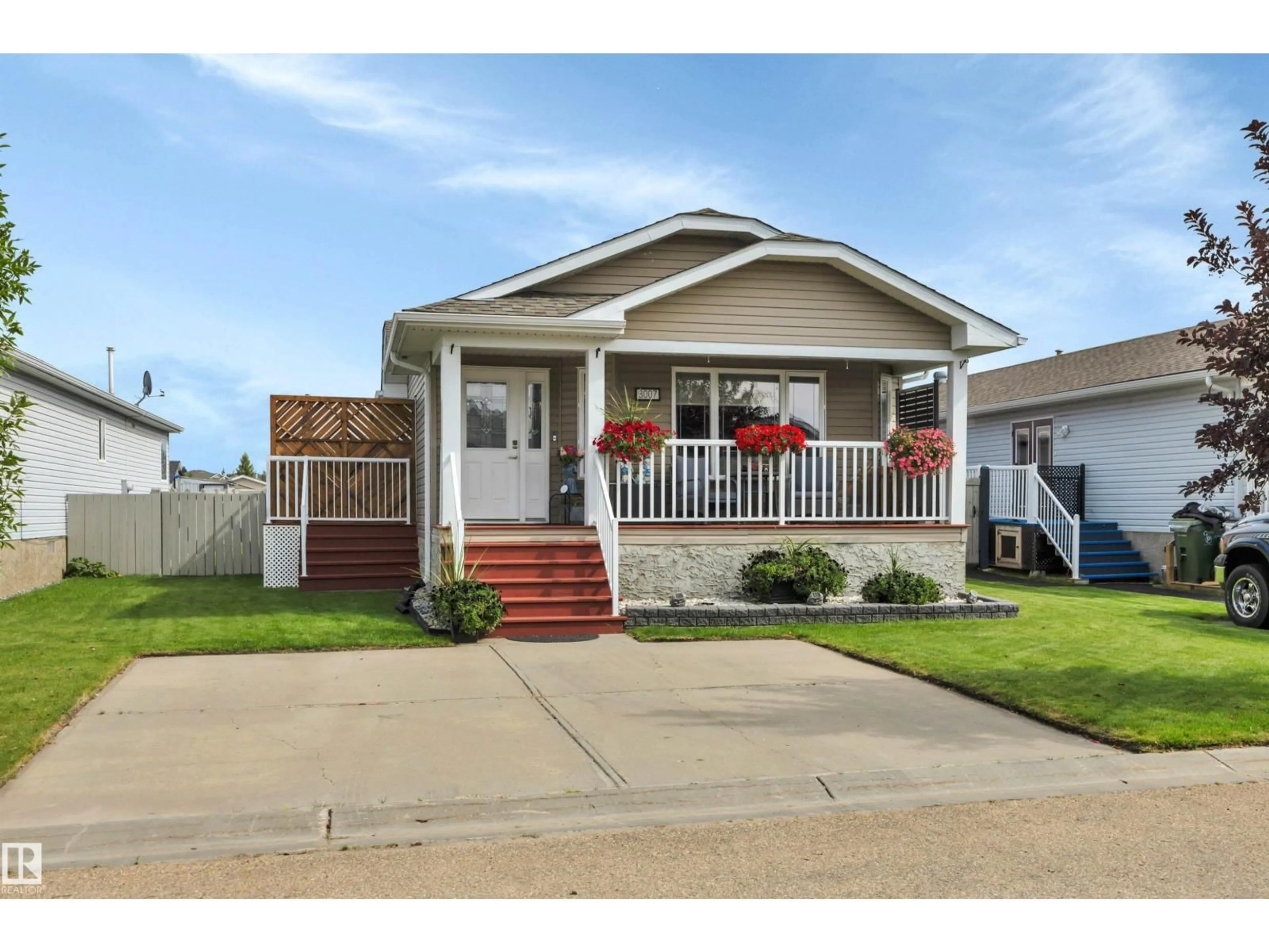Home with vinyl exterior material, street for 3007 ASPEN WD, Leduc Alberta T9E8R5
