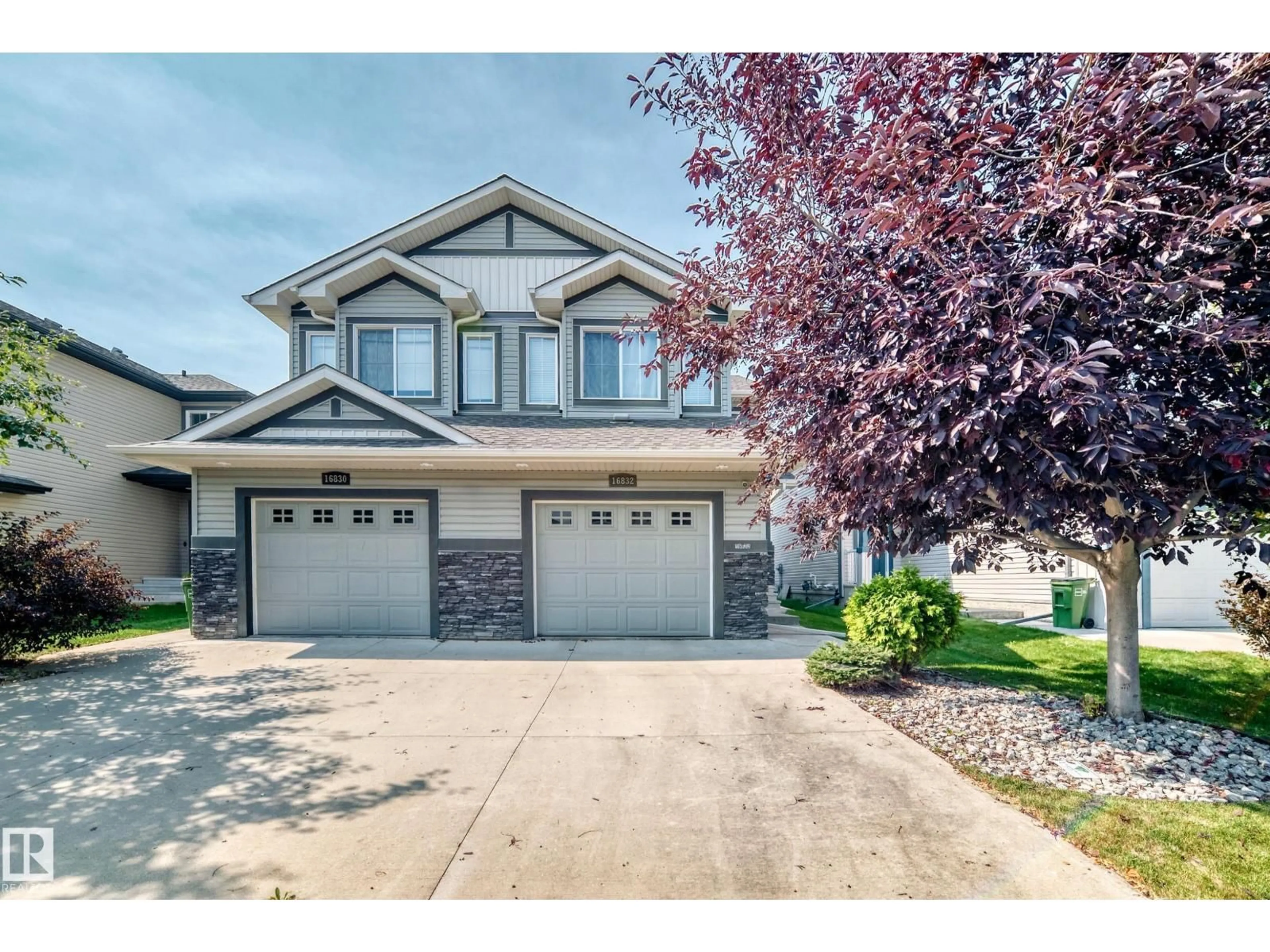 Home with vinyl exterior material, street for 16832 53 ST, Edmonton Alberta T5Y0R7