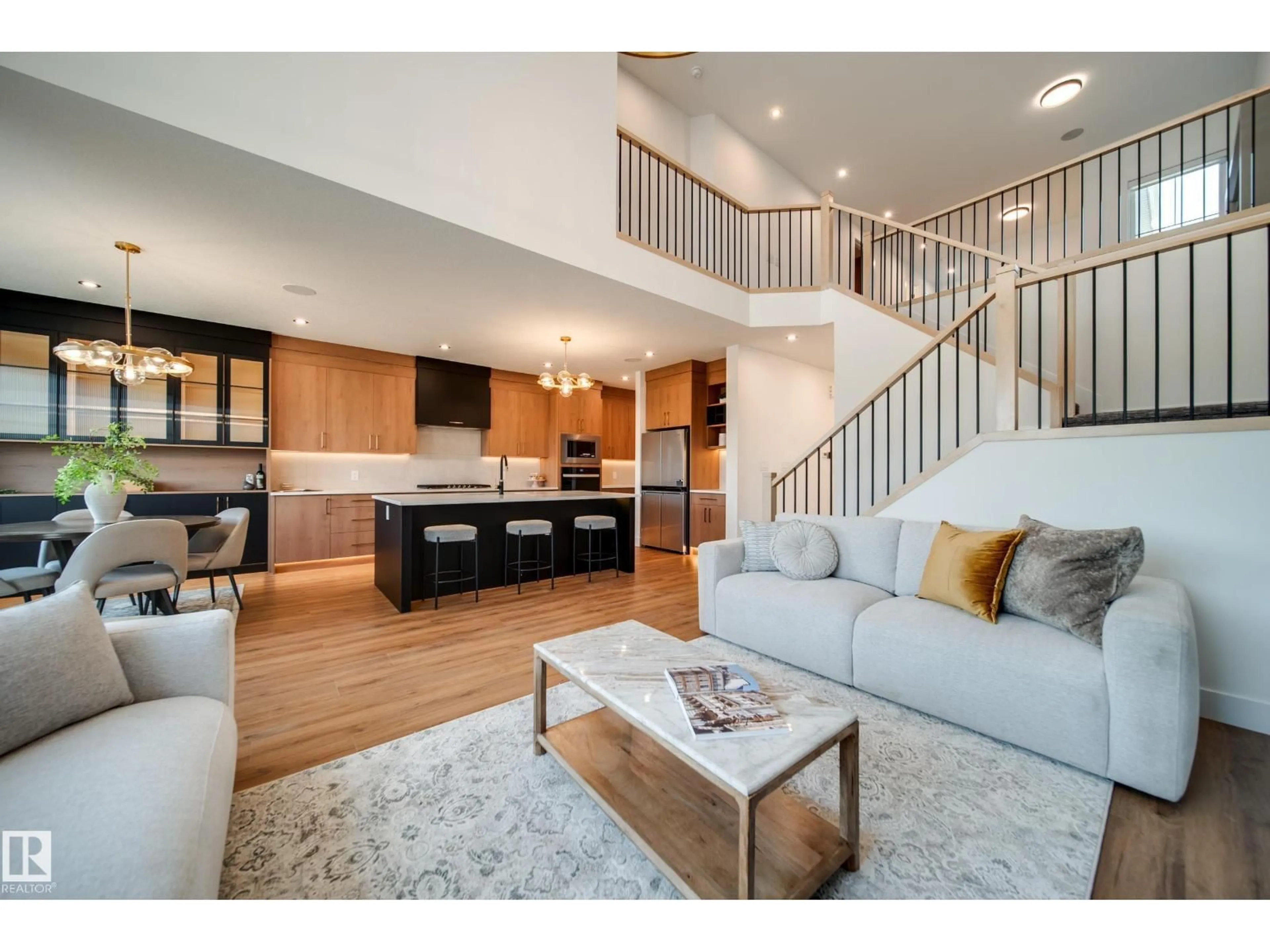 Open concept kitchen, wood/laminate floor for 3337 CHICKADEE DR, Edmonton Alberta T5S0V6